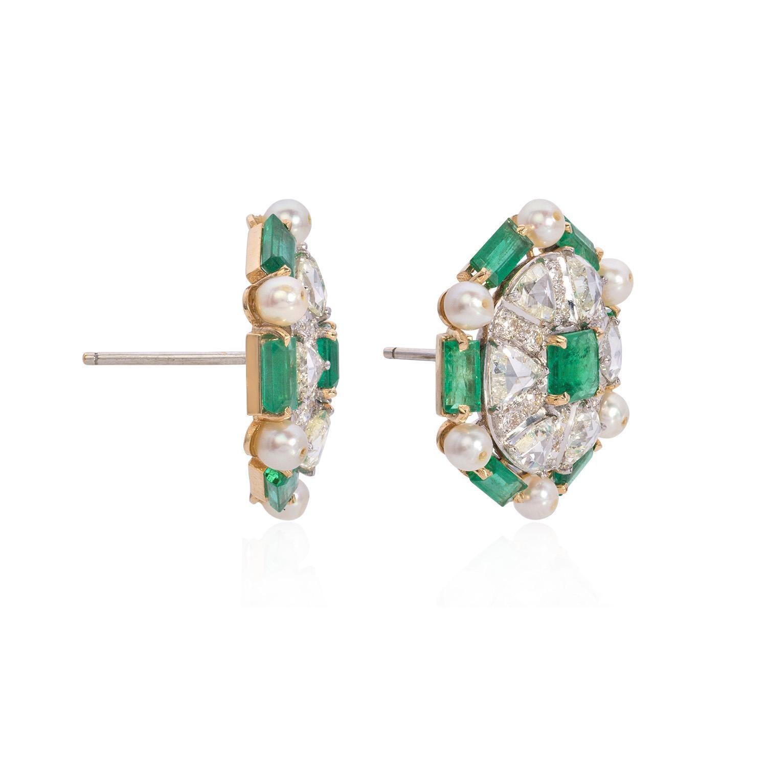 Indulge in the timeless allure of our Pearl and Emerald Earrings, a stunning blend of sophistication and natural beauty. Each earring features a luminous Round-cut pearl with a total carat weight of 1.02, exuding a classic elegance that never goes