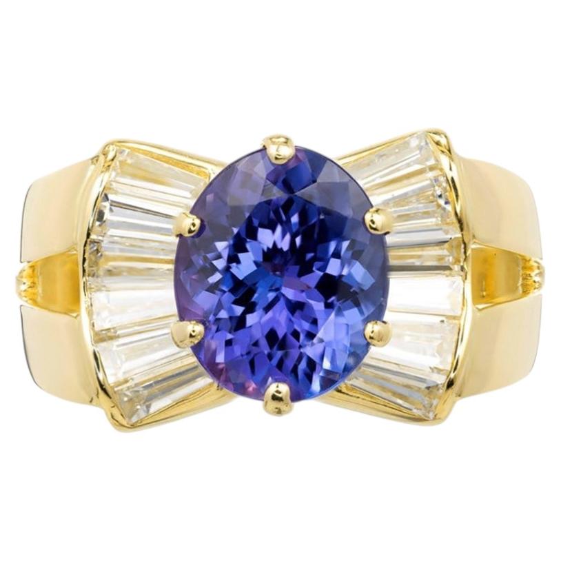 3.38 Carat Purple Blue Oval Tanzanite Diamond 18k Yellow Gold Cocktail Ring For Sale