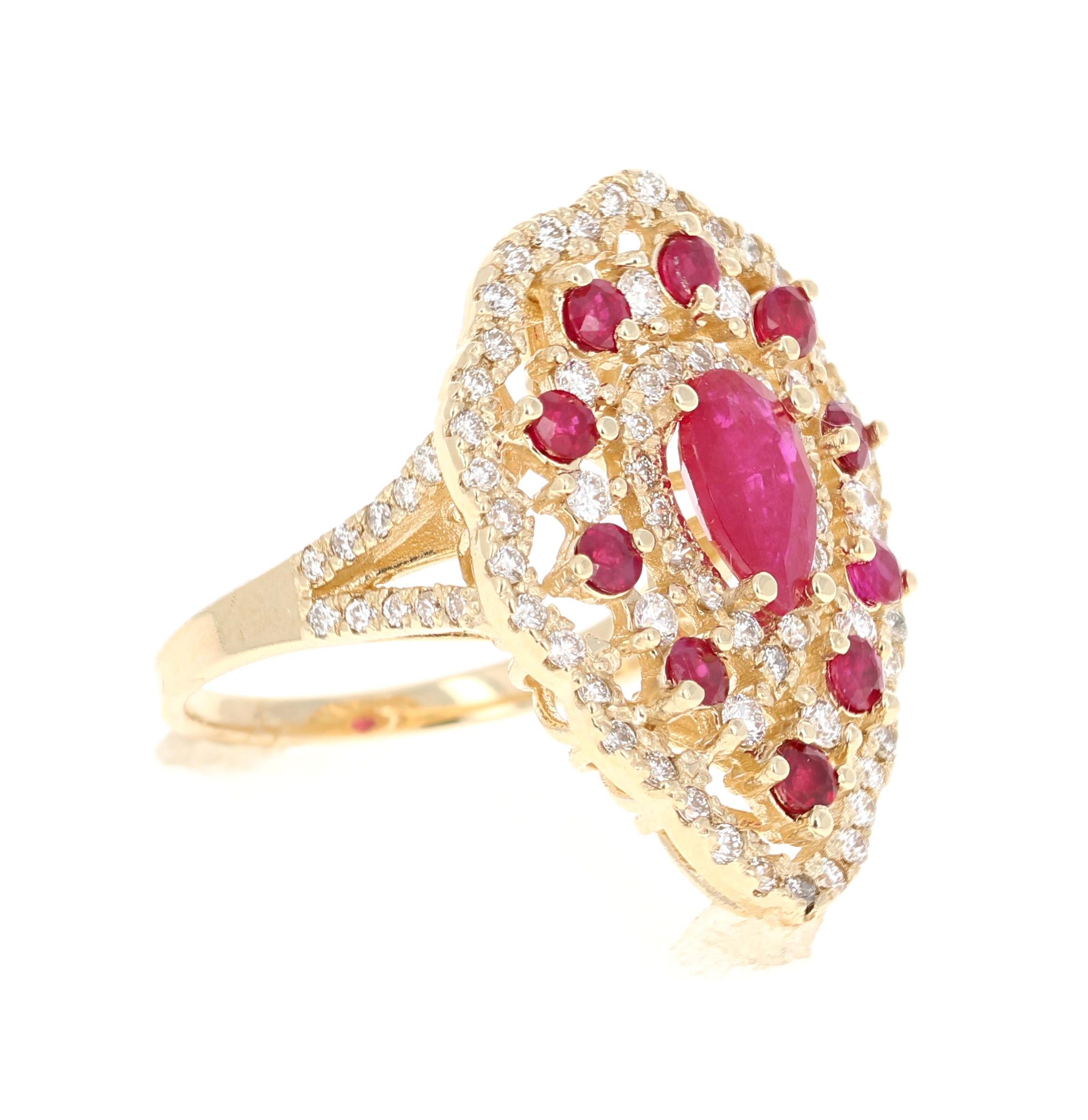 A real statement piece - 3.38 Carat Ruby and Diamond Cocktail Ring in 14K Yellow Gold!
This ring has a gorgeous 1.29 Carat Pear Cut Ruby set in the center that measures at 10 mm x 6 mm and is surrounded by 10 Round Cut Rubies that weigh 0.94 Carats,