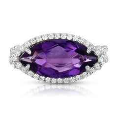 3.38ct. Marquise Amethyst and conflict free Diamond Halo Platinum Cocktail Ring