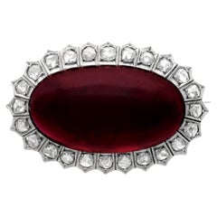 2.38 inches on a ruler 33.8t8 Carat Garnet and 1.92 Carat Diamond Brooch in Yellow Gold