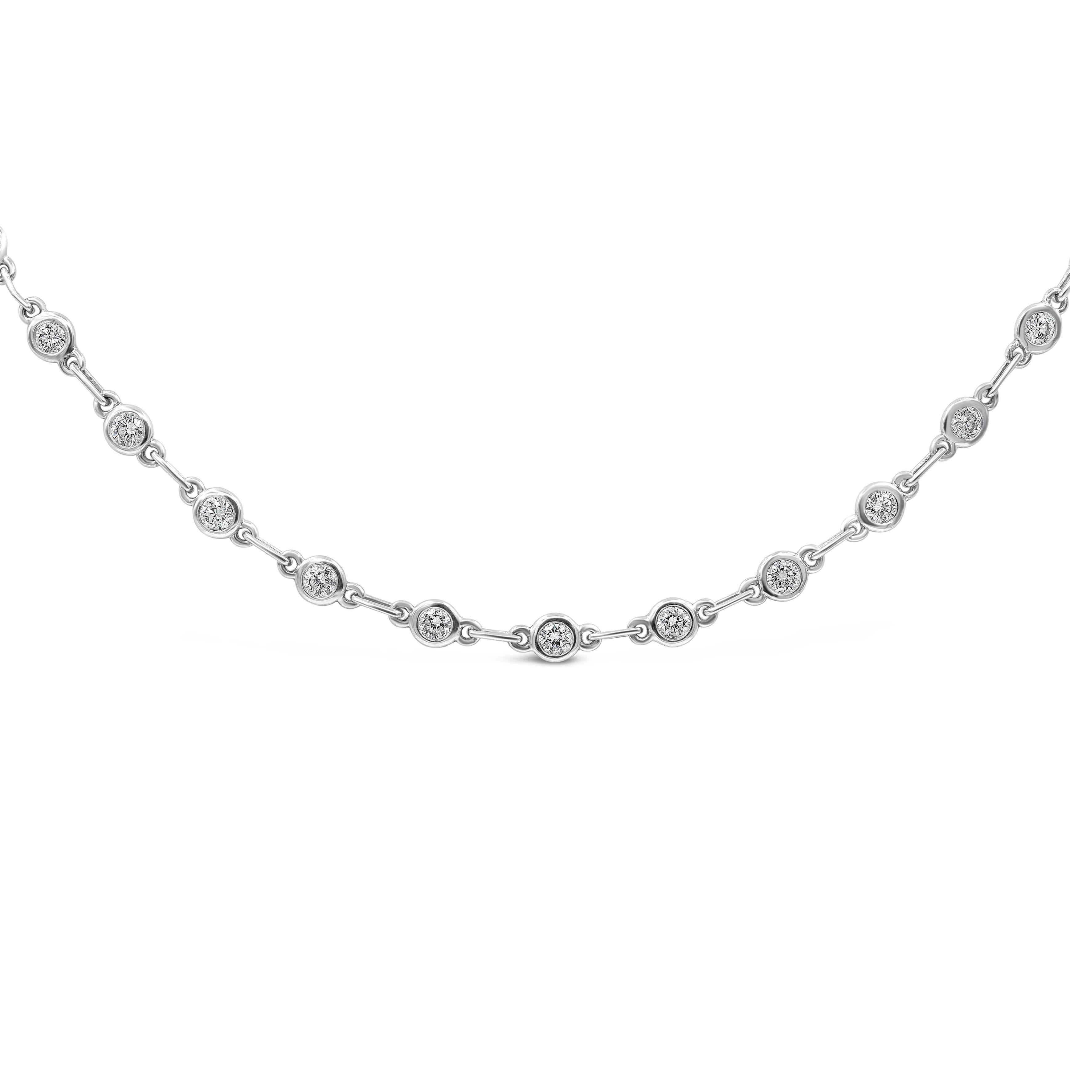 A simple and chic necklace showcasing round brilliant diamonds, bezel set in 18K White Gold, spaced in approximately 0.25 inch increments. Diamonds weigh 3.39 carats total. Approximately 17 inches in length.

Roman Malakov is a custom house,