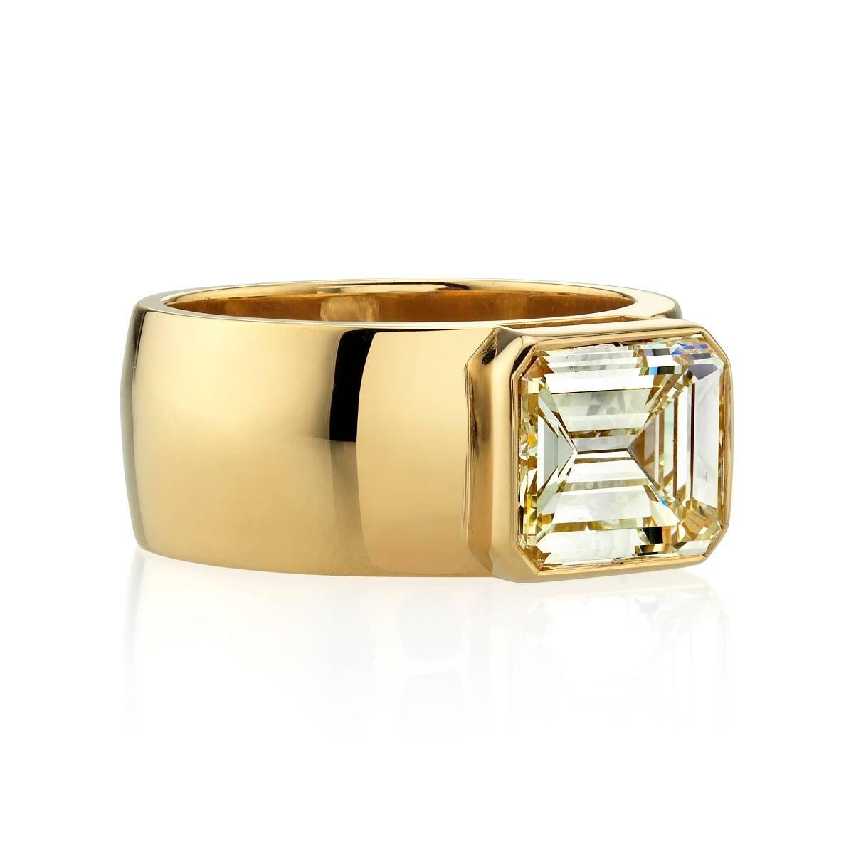 3.39ct L/VS1 GIA certified Emerald cut diamond set in a handcrafted 18k yellow gold mounting. A bold and sleek design. 

Ring is currently a size 6 and can be sized to fit.