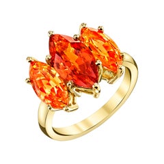 3.39 Carat Marquise Cut Spessartite Garnet Yellow Gold 3-Stone Cocktail Ring