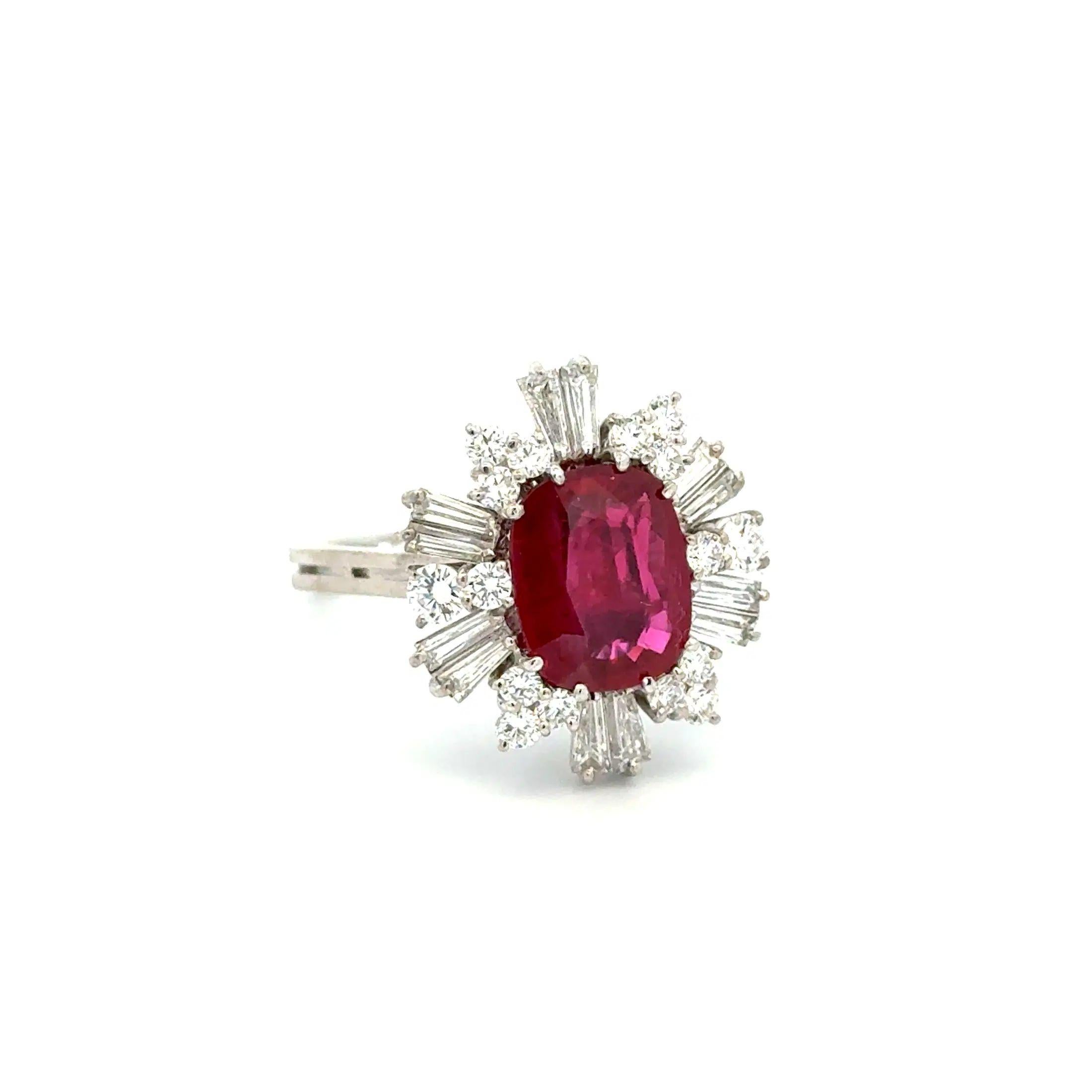 Simply Beautiful! Finely detailed Thai Ruby GIA and Baguette and RBC Diamond Ring. Centering a Gorgeous securely nestled Hand set GIA Thai RUBY, weighing approx. 3.39 Carats, GIA report #2233465138. Surrounded by a Halo of Sparkling Baguette and
