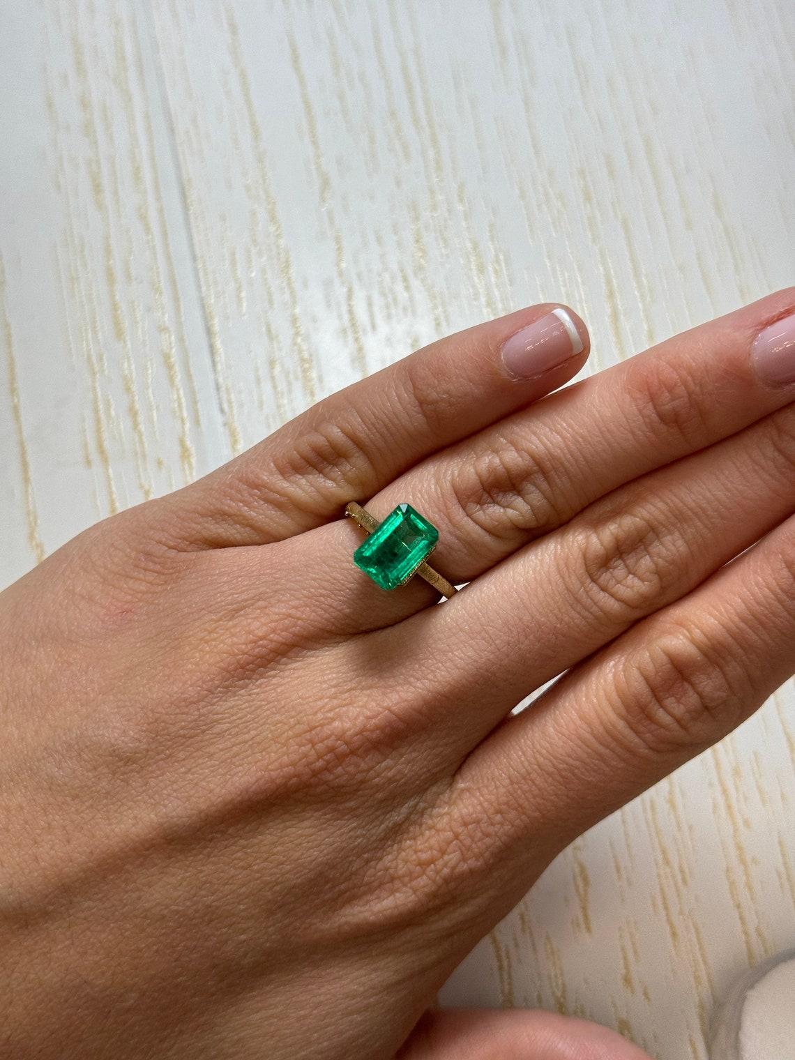 3.39 Carat Vivid Bluish Green Loose Colombian Emerald - Elongated Cut May For Sale 1