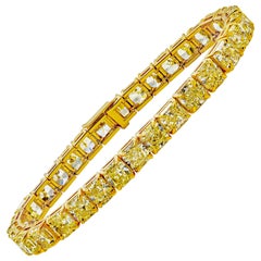 Pulsera de tenis con diamantes amarillos talla radiante de 33,97 quilates en oro amarillo