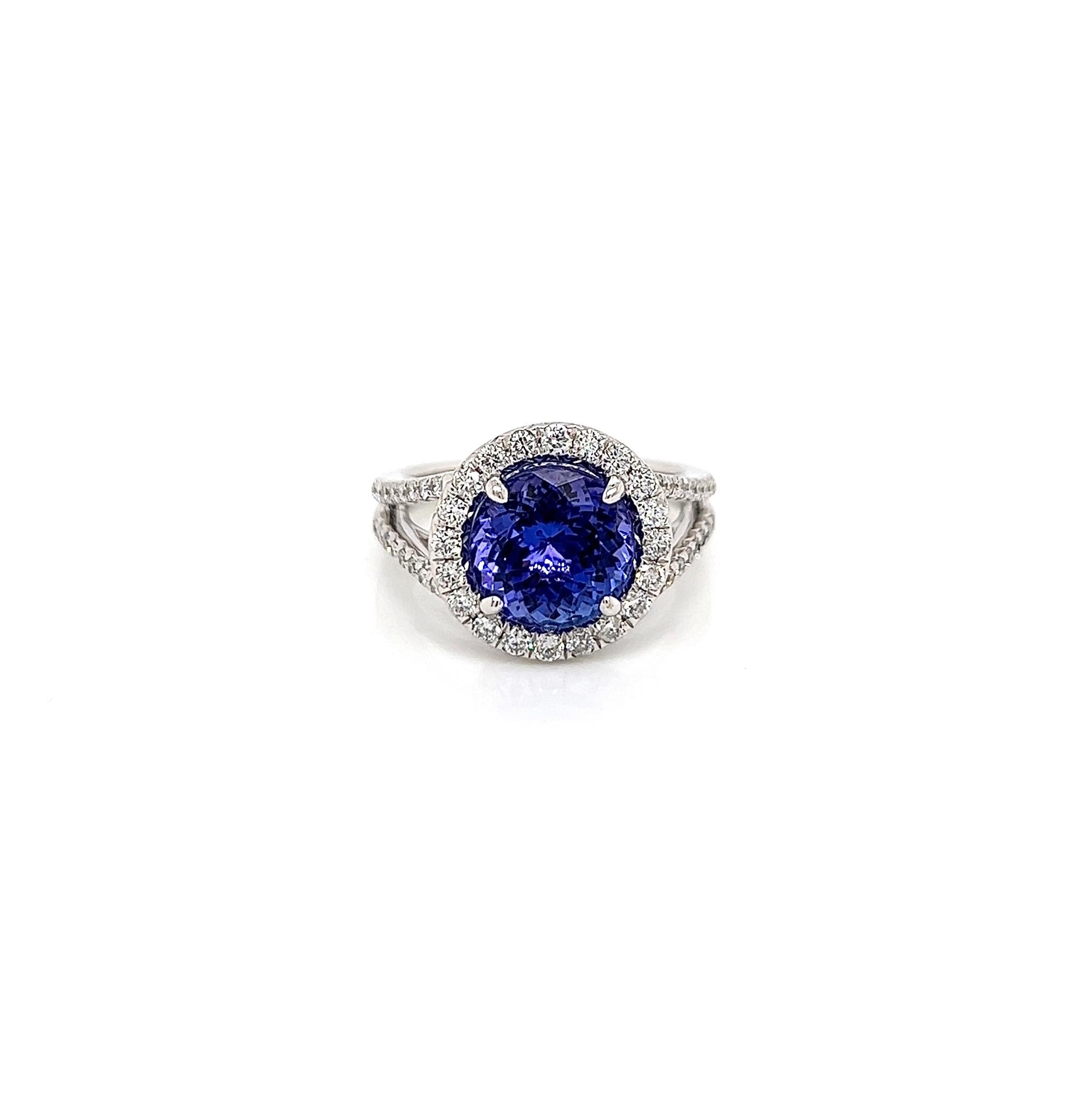 4.15 Total Carat Tanzanite and Diamond Engagement Ring

-Metal Type: 18K White Gold
-3.39 Carat Round Tanzanite 
-0.76 Carat Round Side Diamonds, F-G color, VS1-VS2 clarity
-Size 6.25

Made in New York City.