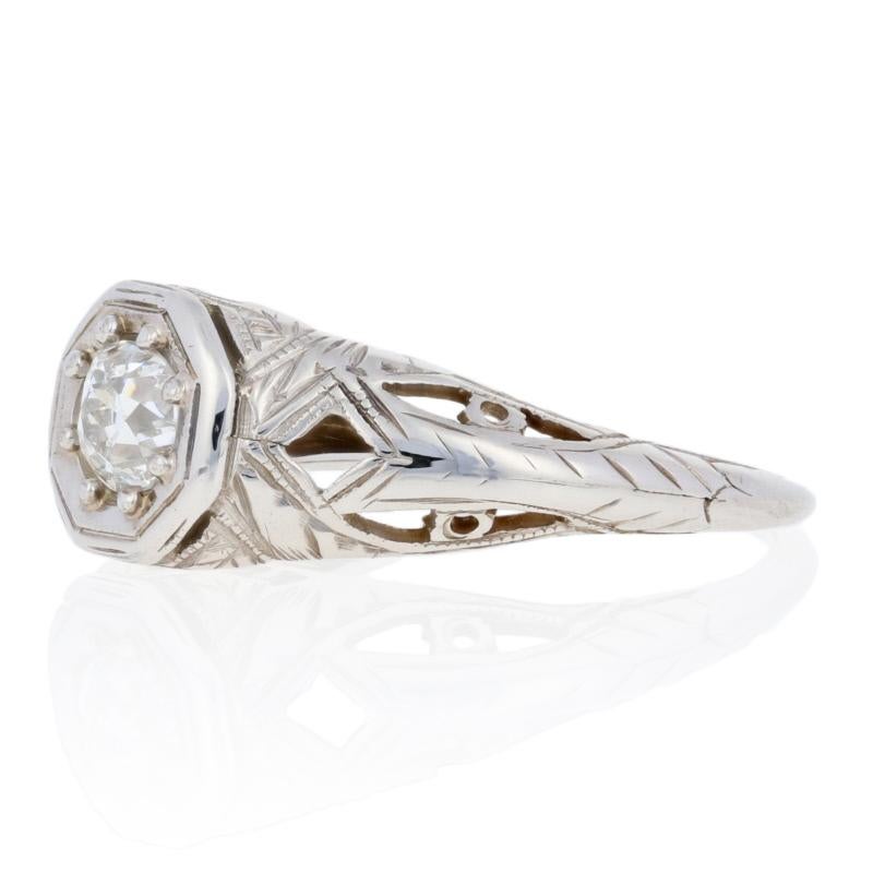 The bride-to-be who cherishes the time-honored values of true love and lifetime commitment will adore this vintage engagement ring! This Art Deco ring dates from the 1920's - 1930's, a period known for innovative designs and meticulous