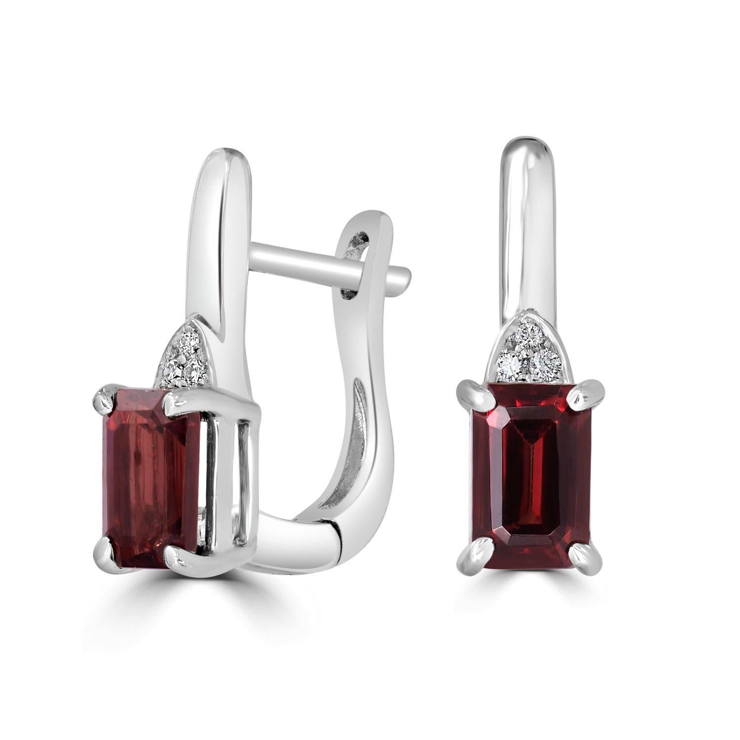 These 14K white gold earrings are set with an emerald-cut cut Garnet and bordered by splendid round Diamonds that will dazzle everyone!

3.3Tct Garnet Earrings
0.03Tct Diamonds Set
14k White Gold