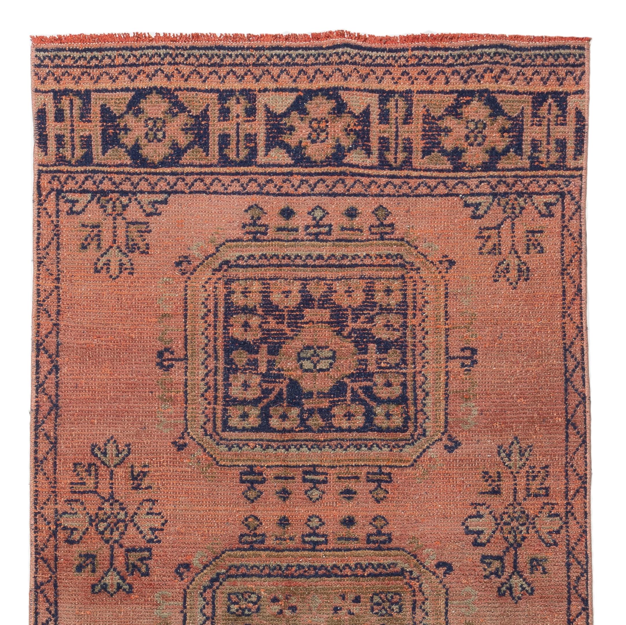 One of a pair of vintage Turkish Oushak runners. Finely hand-knotted with even medium wool pile on wool foundation. Very good condition. Sturdy and as clean as a brand new rug (deep washed professionally). Measures: 3.3 x 10.5 ft.