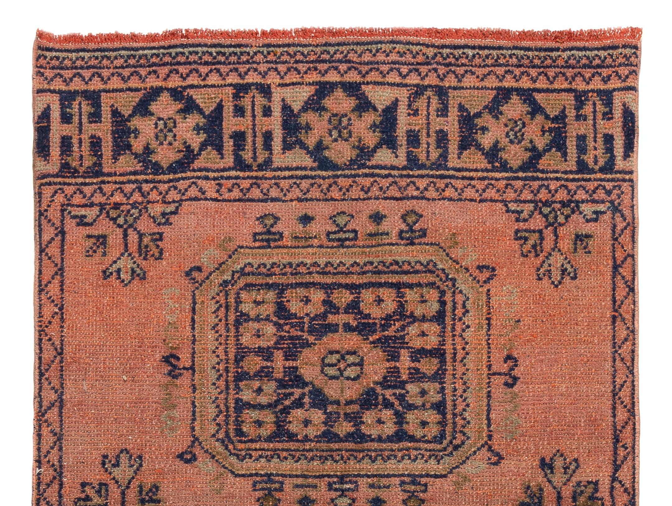 One of a pair of vintage Turkish Oushak runners. Finely hand-knotted with even medium wool pile on wool foundation. Very good condition. Sturdy and as clean as a brand new rug (deep washed professionally). 
Measures: 3.3 x 10.5 ft.