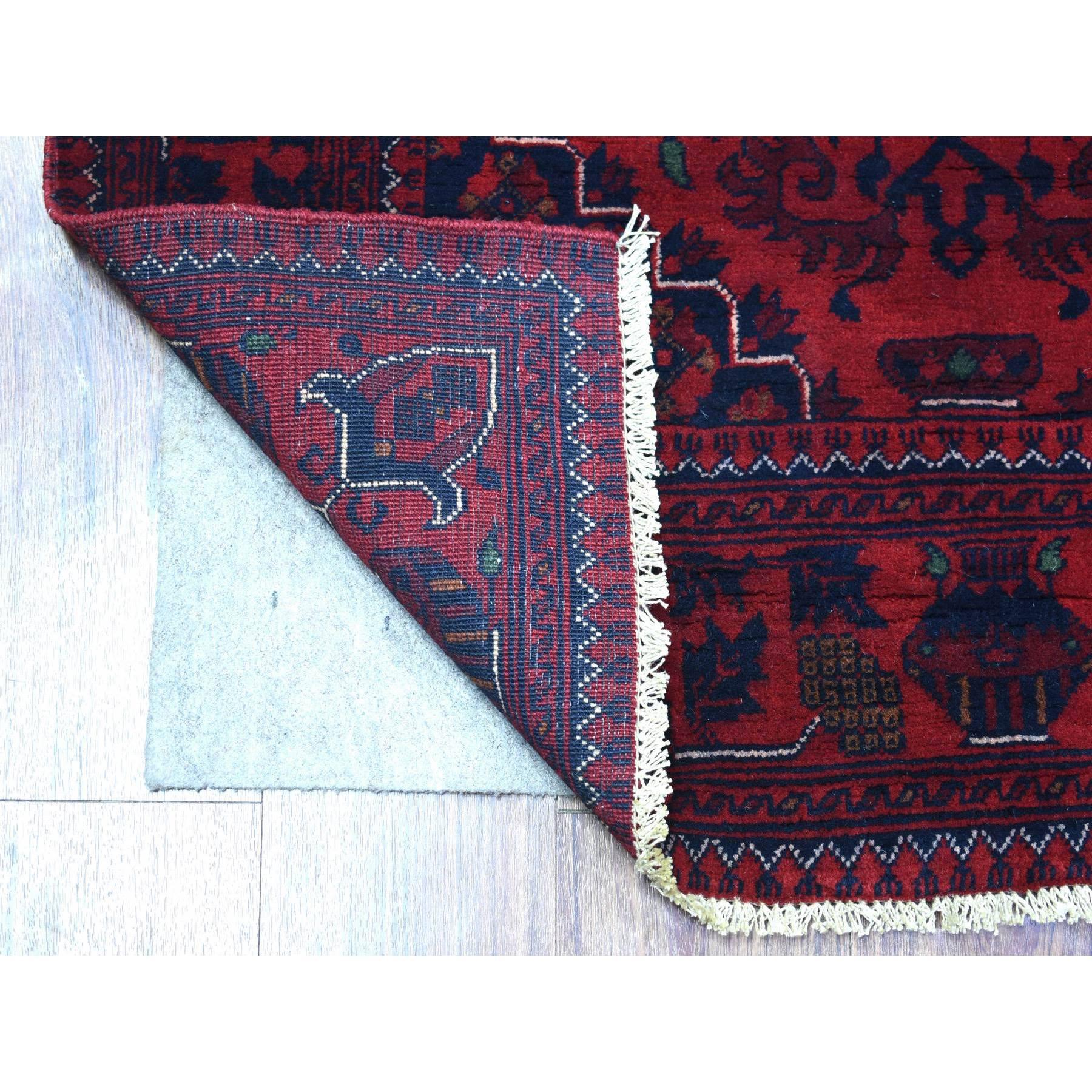 This is a truly genuine one-of-a-kind Red Hand Knotted With Heriz Design Afghan Khamyab Pure Wool Rug . It has been Knotted for months and months in the centuries-old weaving craftsmanship techniques by expert artisans.
Primary materials: