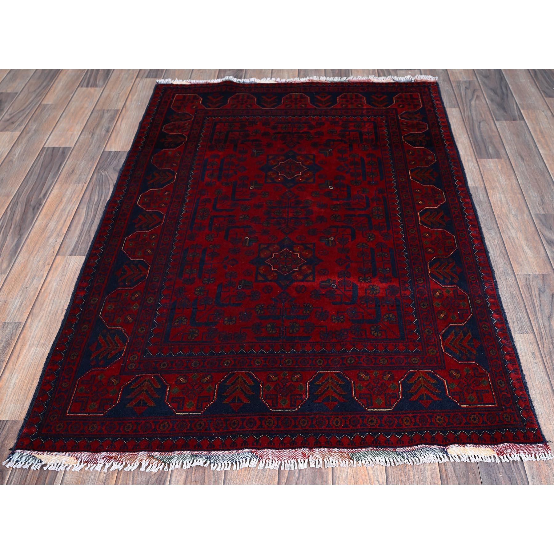 Ruby Red, Afghan Khamyab with Geometric Pattern, Hand Knotted, Soft and Velvety Wool, Vegetable Dyes, Oriental Rug
Primary materials: Wool
Latex: No Pile 
height: 0.25 Inches
Style: Traditional
Primary color: Red
Secondary colors: Midnight Blue,