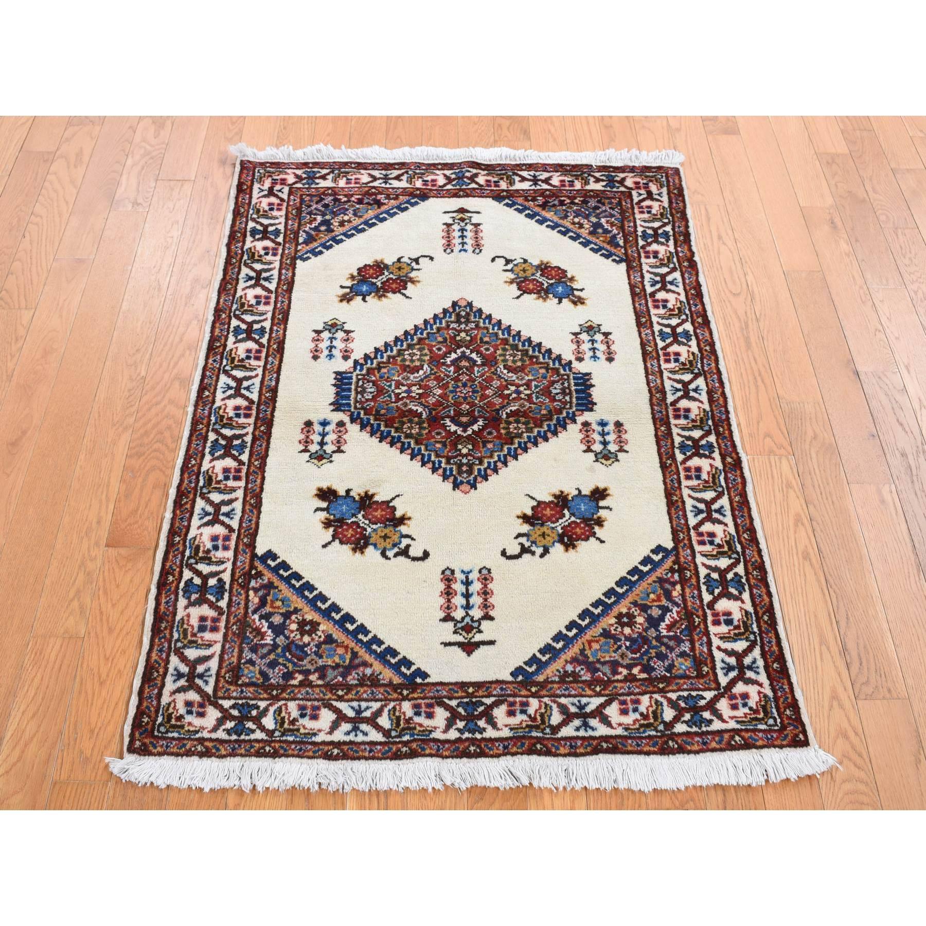 Ivory, New Bohemian Karabakh, Serrated Center Medallion and Flower Design, Pure Wool, Hand Knotted, Oriental Rug
Primary materials: Wool
Latex: No Pile 
height: 0.25 Inches
Style: Traditional
Primary color: Ivory
Secondary colors: Blue, Yellow,