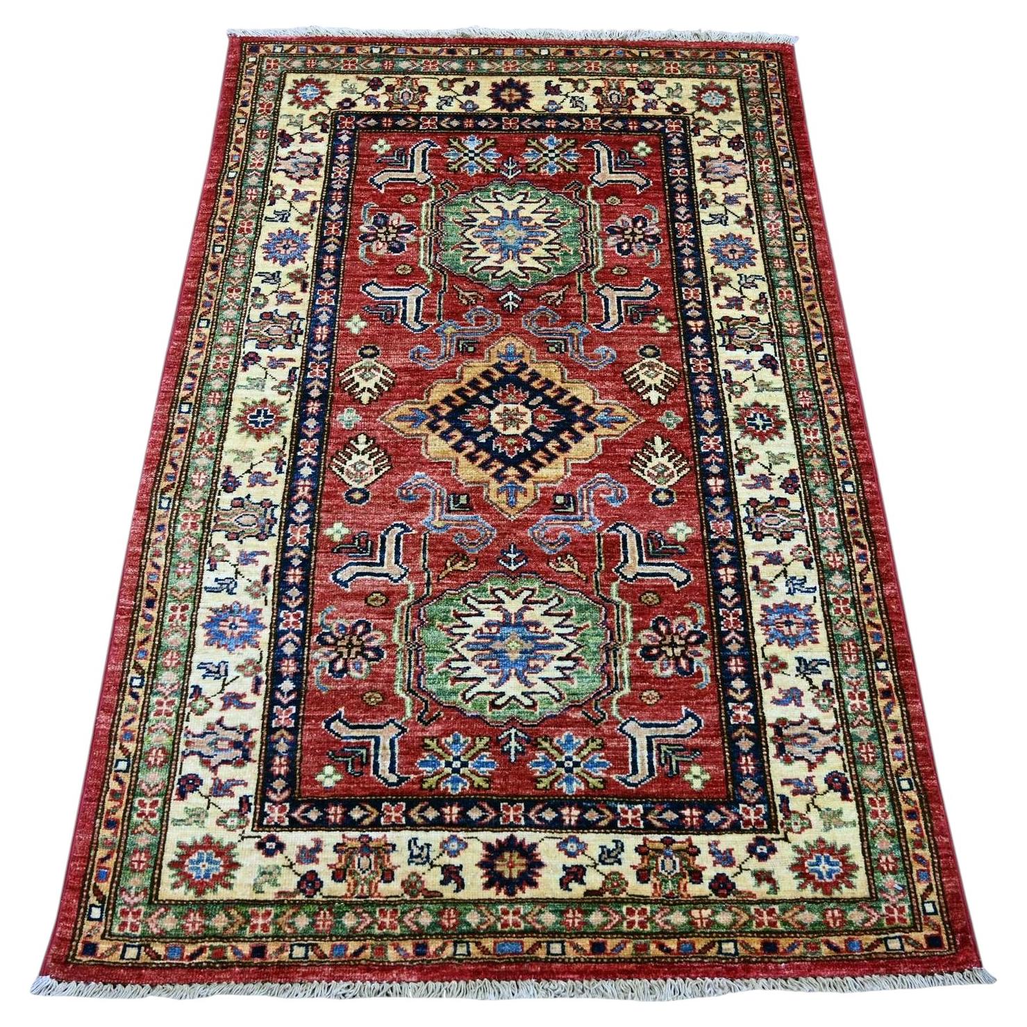 3'3"x5' Ruby Red Wool Afghan Super Kazak with Geometric Medallions Design Rug For Sale
