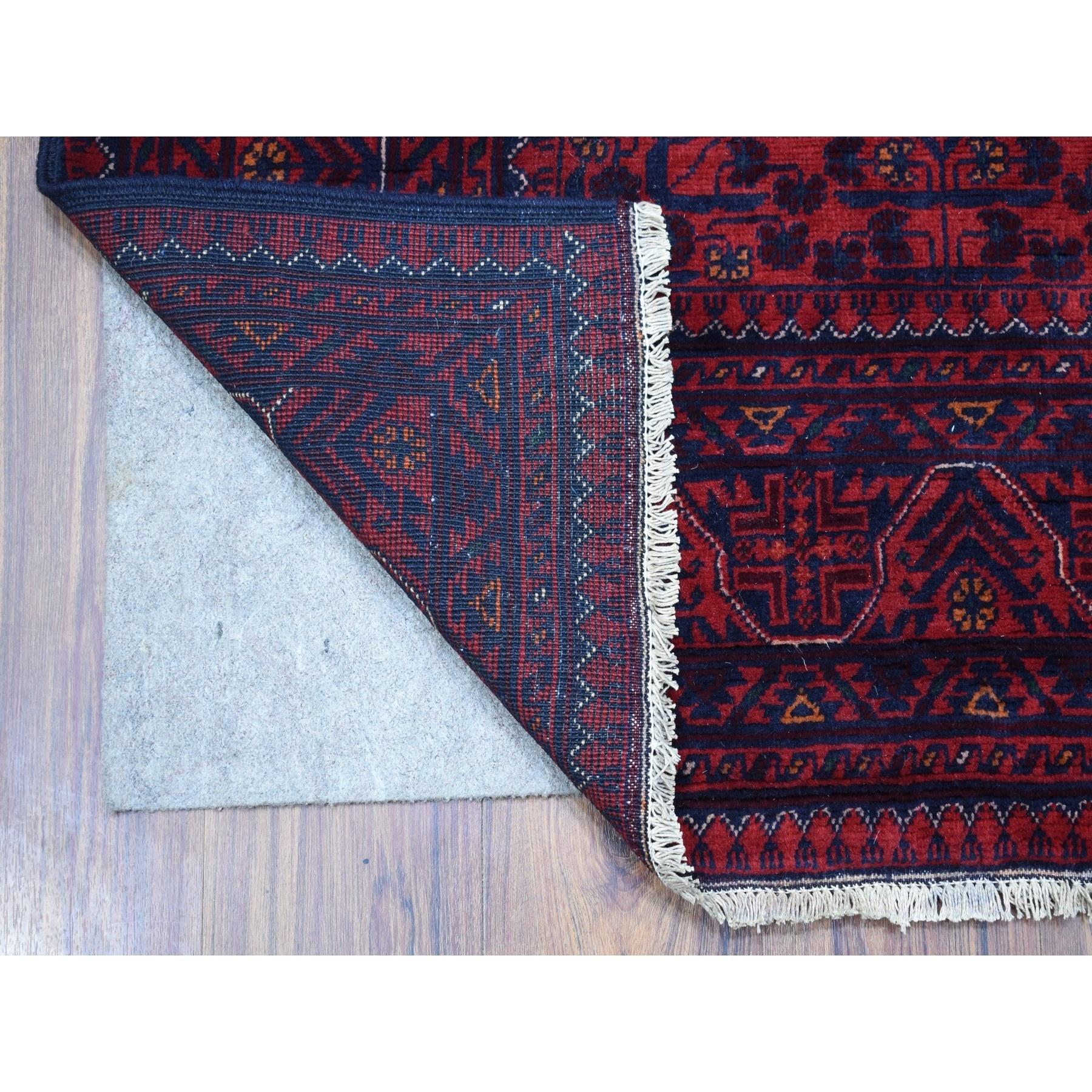 This is a truly genuine one-of-a-kind Tribal and Geometric Design Extra Soft Wool Deep and Saturated Red Afghan Khamyab Hand Knotted Oriental Rug. It has been woven for months and months in the centuries-old Persian weaving craftsmanship techniques