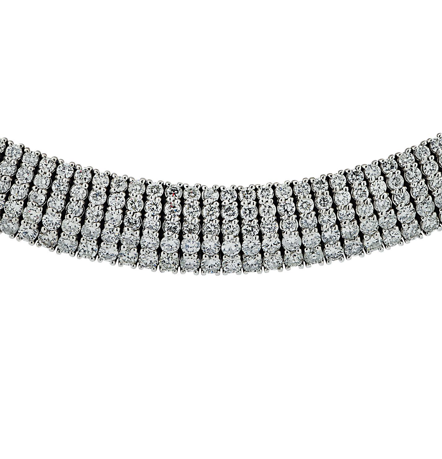Sensational Choker necklace crafted in white gold, featuring 854 round brilliant cut diamonds weighing approximately 34 carats total, G-H color SI clarity. Five rows of round brilliant cut diamonds sweep around the neck, creating a spectacular