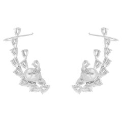 Boucles d
oreilles manchette en or blanc 18 carats avec diamants poire de 3,4 carats de pureté SI de couleur hi-colore