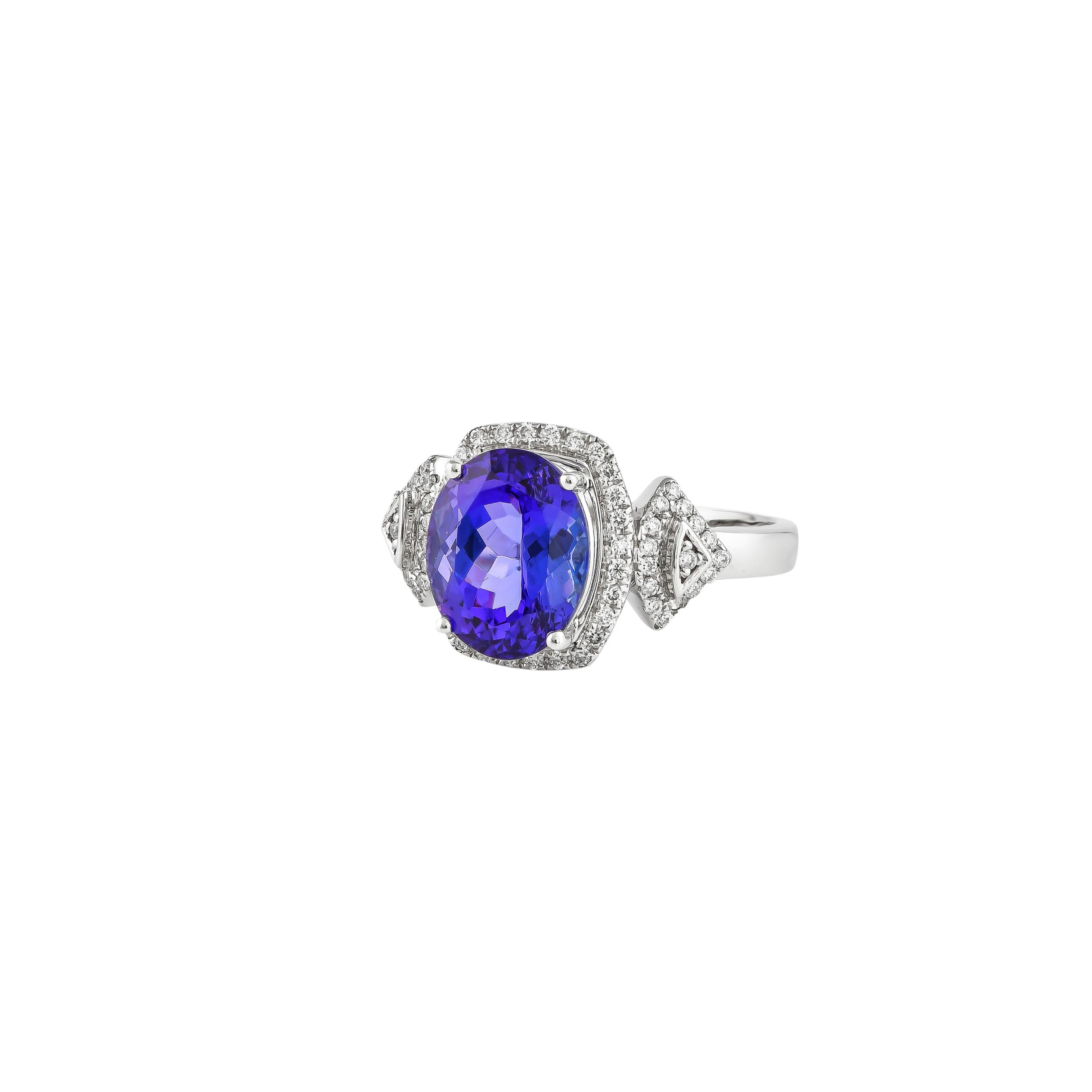 Contemporary 3.4 Carat Tanzanite and White Diamond Ring in 18 Karat White Gold For Sale