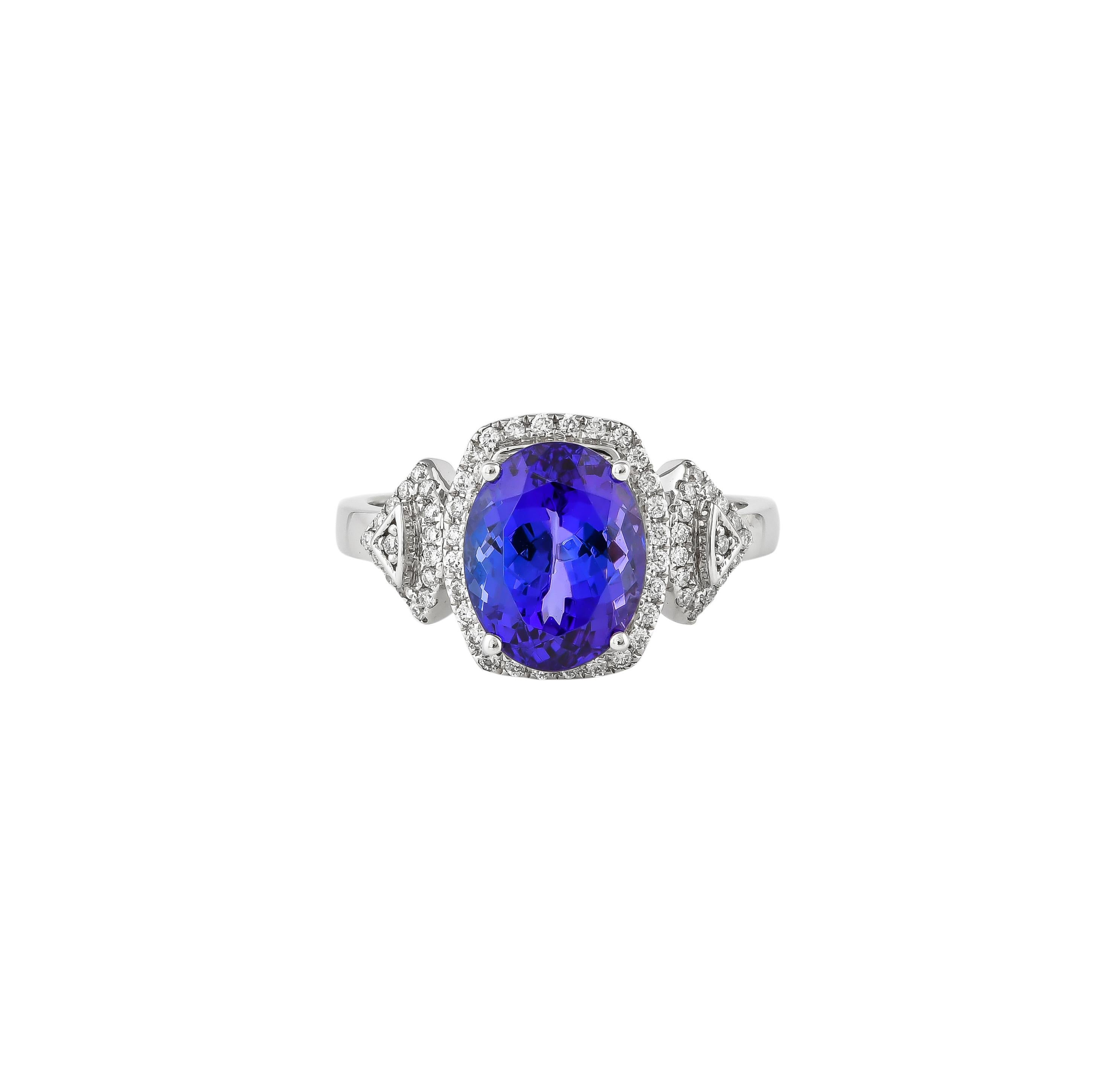 Oval Cut 3.4 Carat Tanzanite and White Diamond Ring in 18 Karat White Gold For Sale