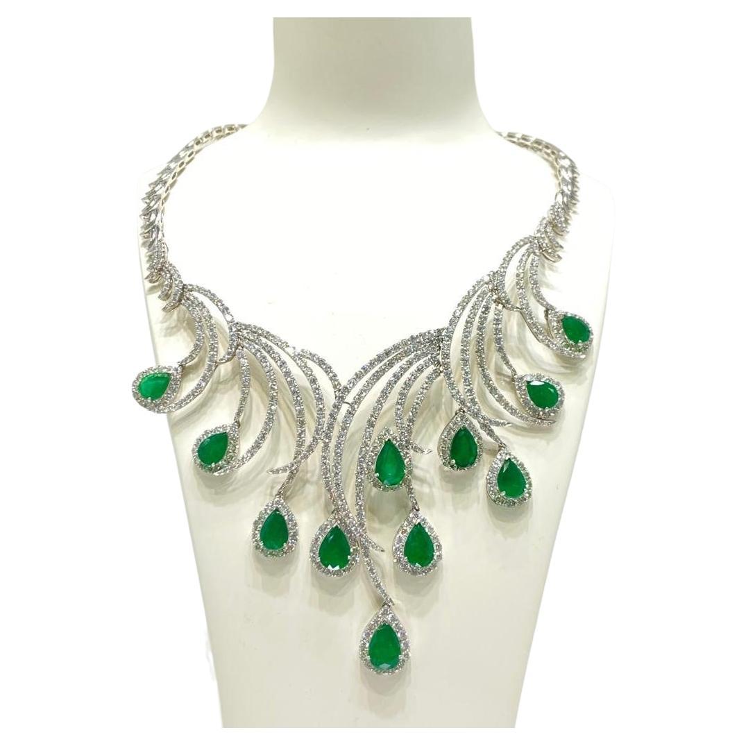 This gorgeous emerald and diamond necklace set is among the most sought after. A rich deep green hue, with a mesmerizing sparkle, these Zambian emeralds are cut to perfection. An exquisite emerald and diamond necklace, 11 pear shaped emeralds weight