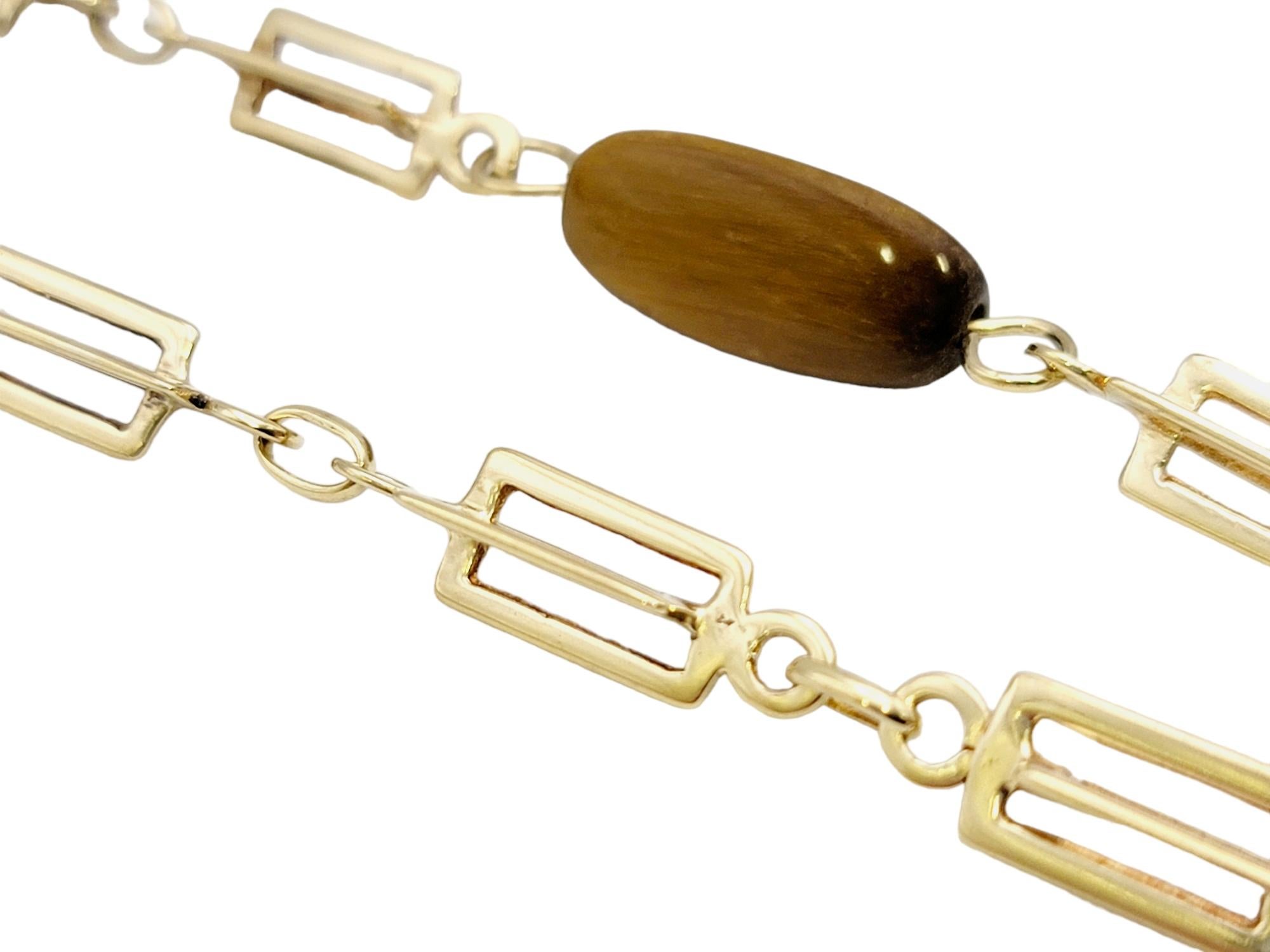 Triangular Cabochon Tiger's Eye Station Necklace 14 Karat Gold Chain In Good Condition For Sale In Scottsdale, AZ
