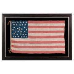 34-Sterne-Antike amerikanische Flagge mit Sanduhr-Medaillon-Ständern und Sternen, ca. 1861-1863