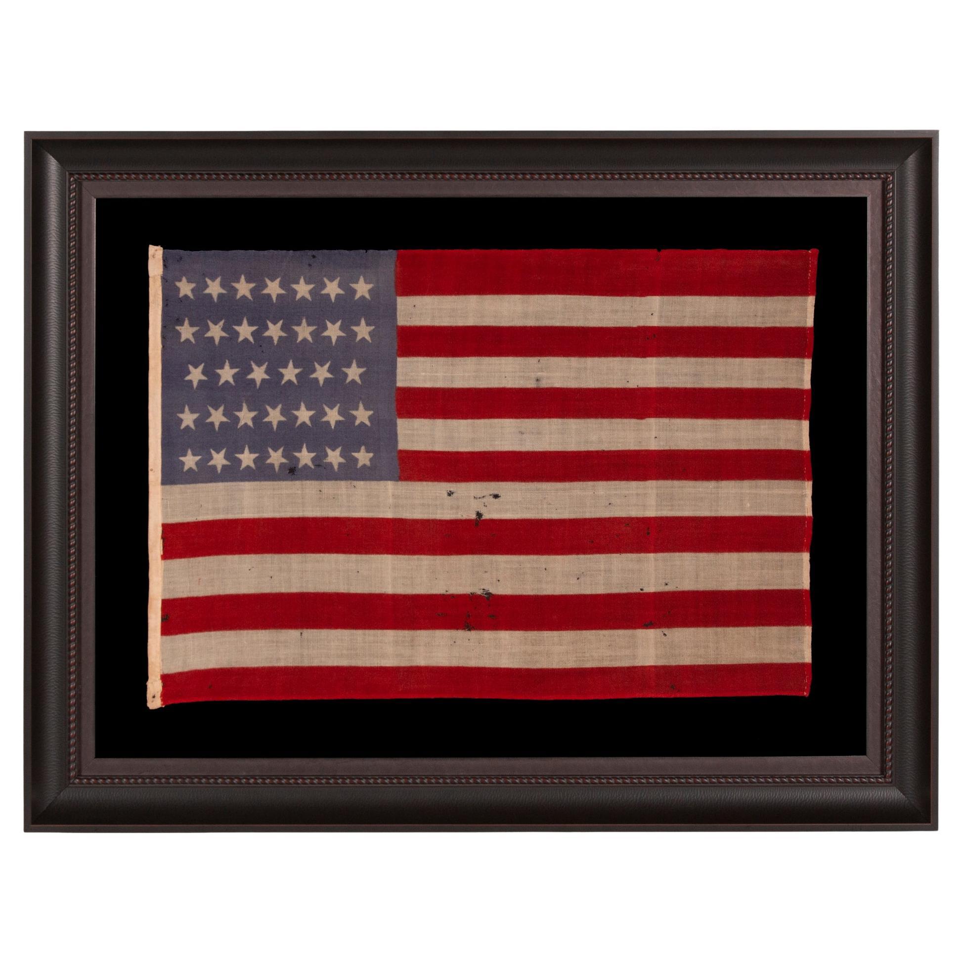 34 TUMBLING STARS auf einem ANTIQUE AMERICAN FLAG, CIVIL WARPeriode, 1861-63, KANSAS