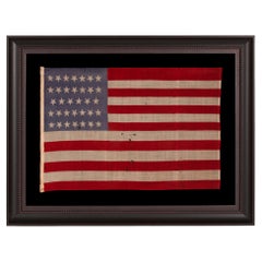34 TUMBLING STARS on an ANTIQUE AMERICAN FLAG, CIVIL WAR PERIOD, 1861-63, KANSAS