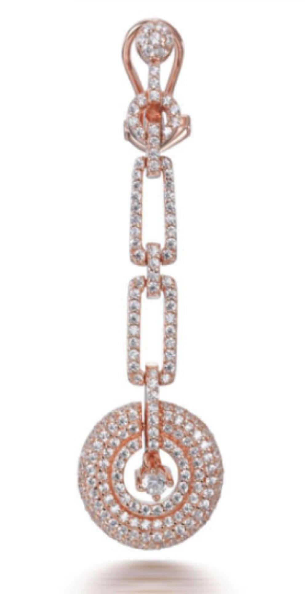 A show stopping design from our Deco Collection, refined and decadent, these beautiful drop earrings feature a solid wheel containing a suspended brilliant cut cubic zirconia hanging from an open chain set onto a stud pierced omega clip.

Composed