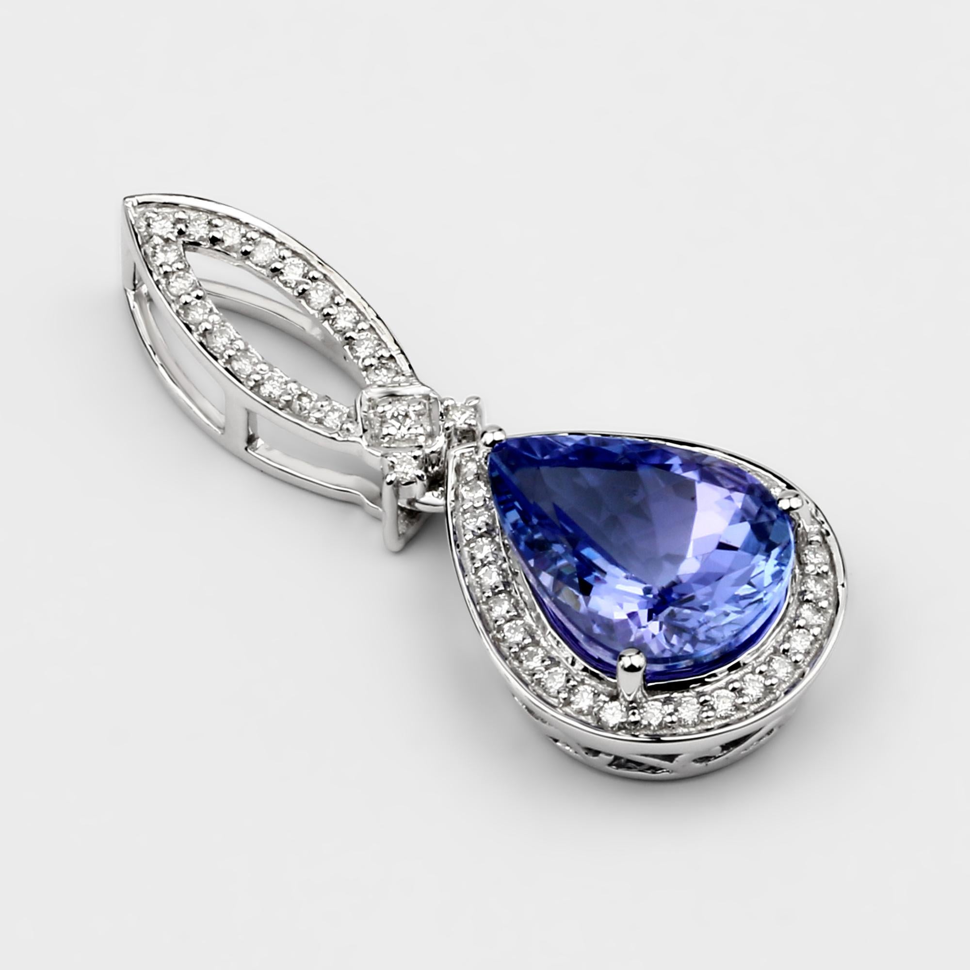 3.40 Carat Pear-shaped Tanzanite and 0.35 Carats White Diamond 14 Karat White Gold Pendant

Center Stone Details:
Stone: Tanzanite
Shape: Pear
Size: 11.40x8.90mm
Weight: 3.40 carat

Diamond Details:
Shape: Round Brilliant (50)
Carat Weight: 0.23