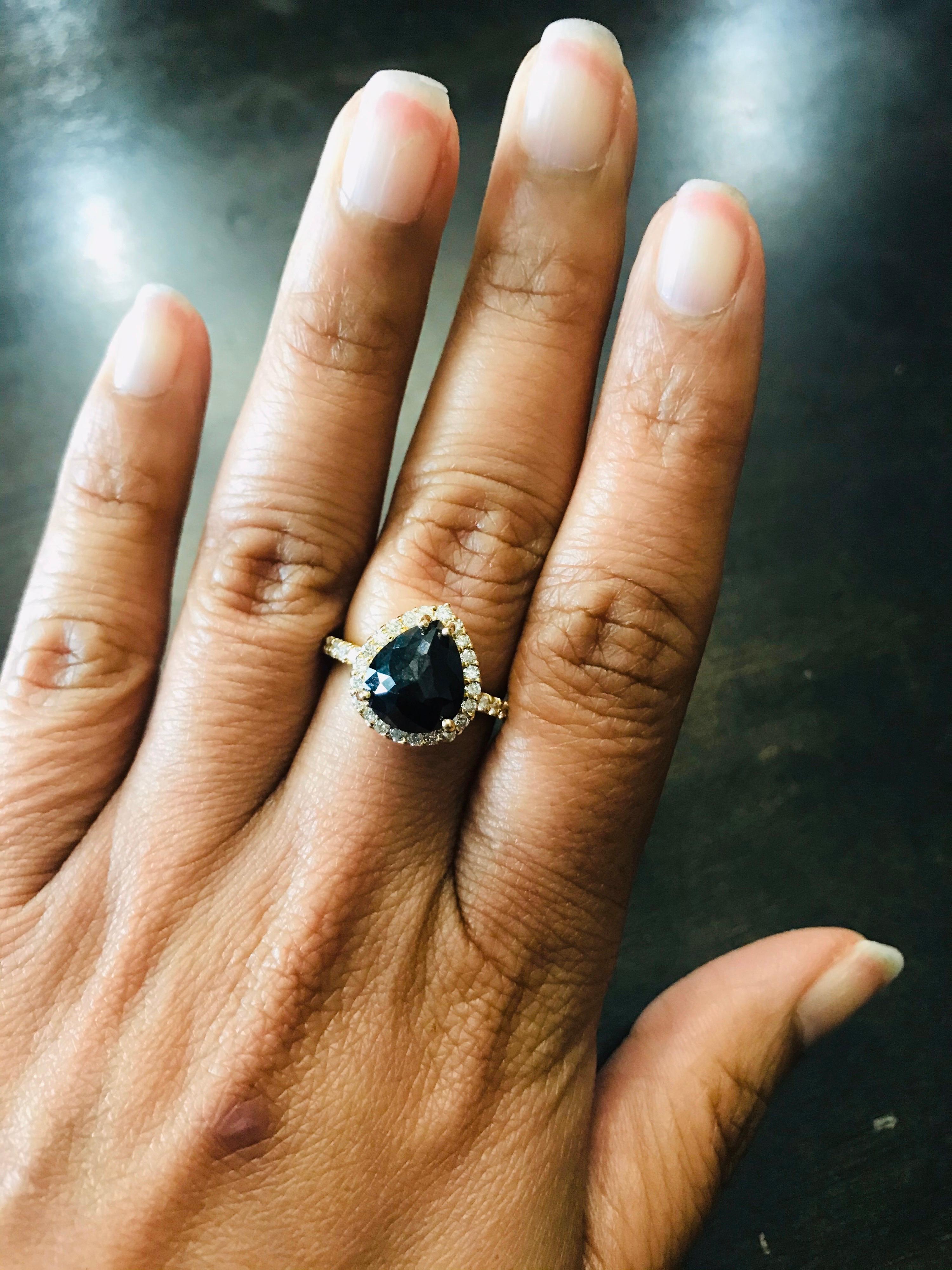 pear black diamond engagement ring