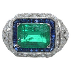 3.40 Carat Weight Emerald and Round Diamond Ring in Platinum
