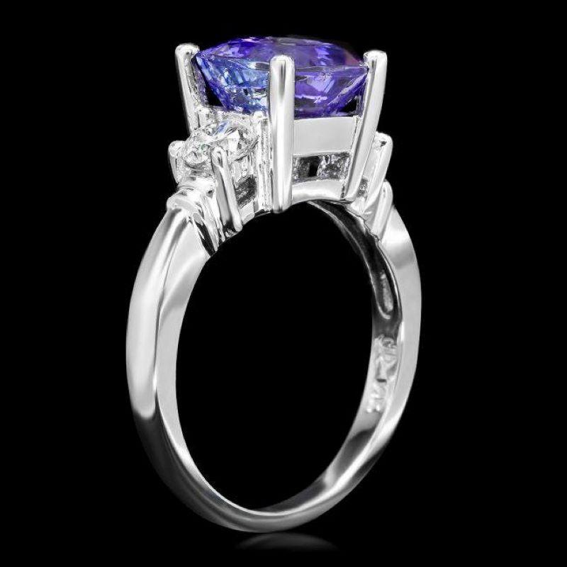 3.40 Carats Natural Tanzanite and Diamond 14K Solid White Gold Ring

Total Natural Tanzanite Weight is: Approx. 2.90 Carats 

Tanzanite Measures: Approx. 8.00 x 8.00mm

Natural Round Diamonds Weight: Approx. 0.50 Carats (color G-H / Clarity