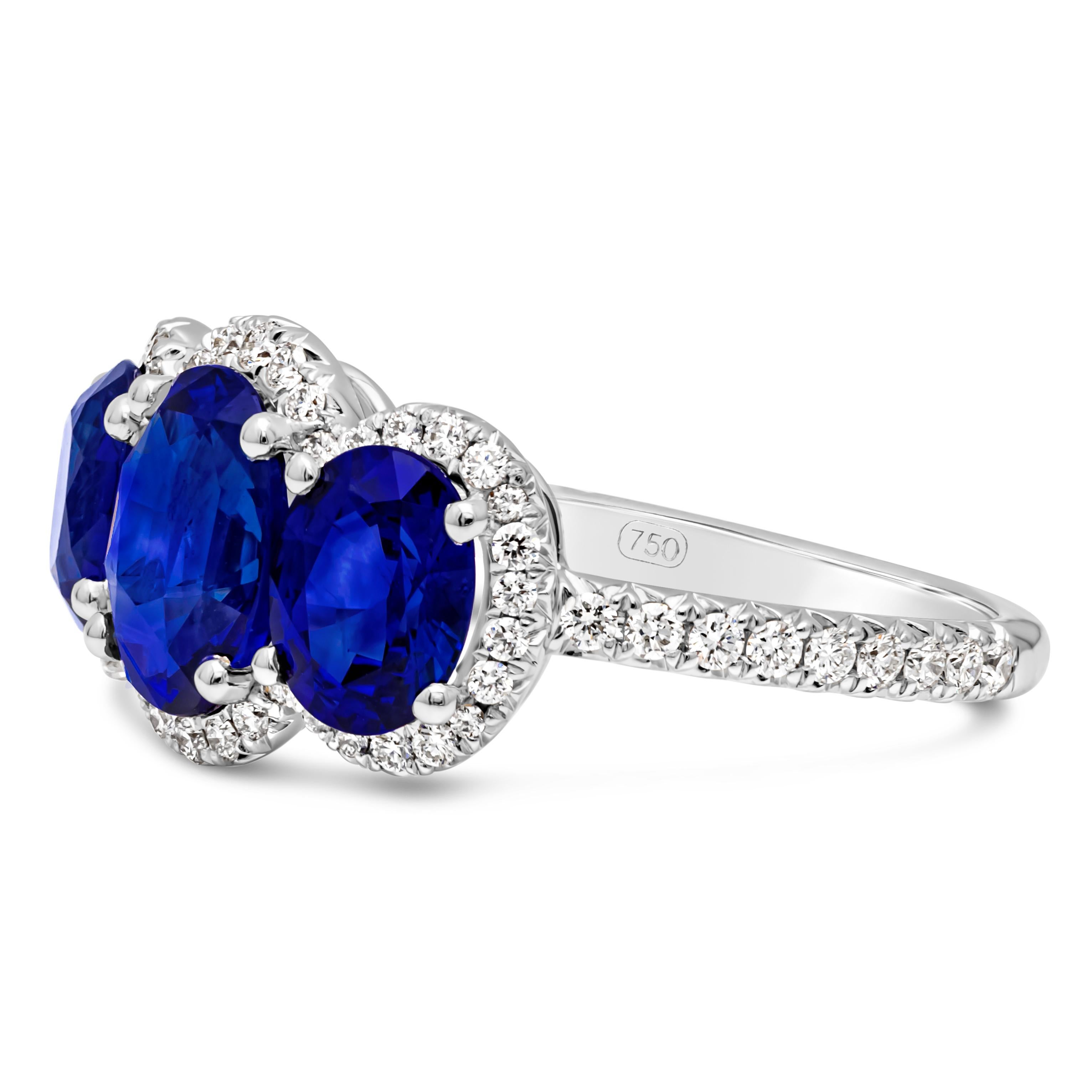 Contemporary 3.40 Carats Total Oval Cut Blue Sapphire & Diamond Three-Stone Engagement Ring For Sale