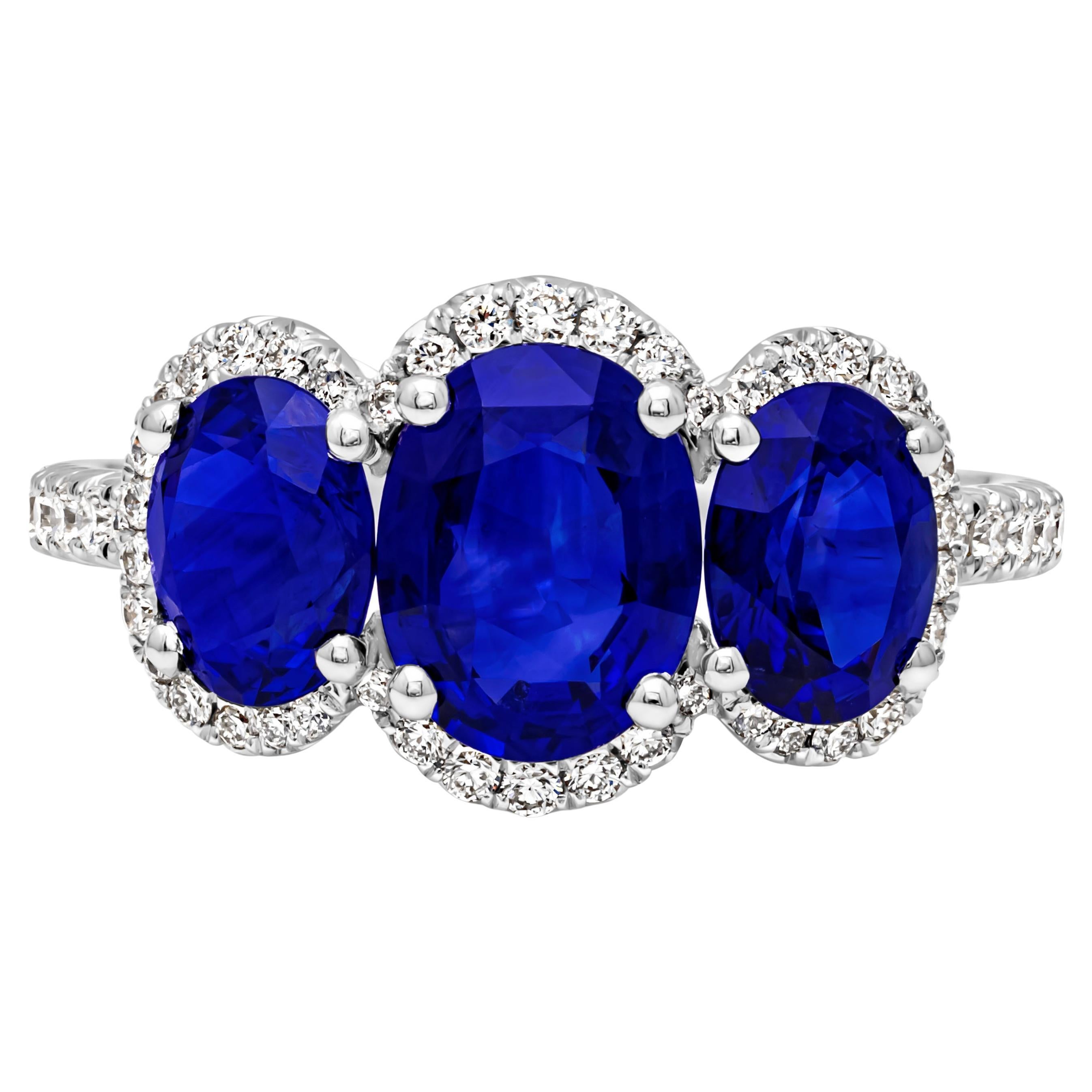 3.40 Carats Total Oval Cut Blue Sapphire & Diamond Three-Stone Engagement Ring For Sale