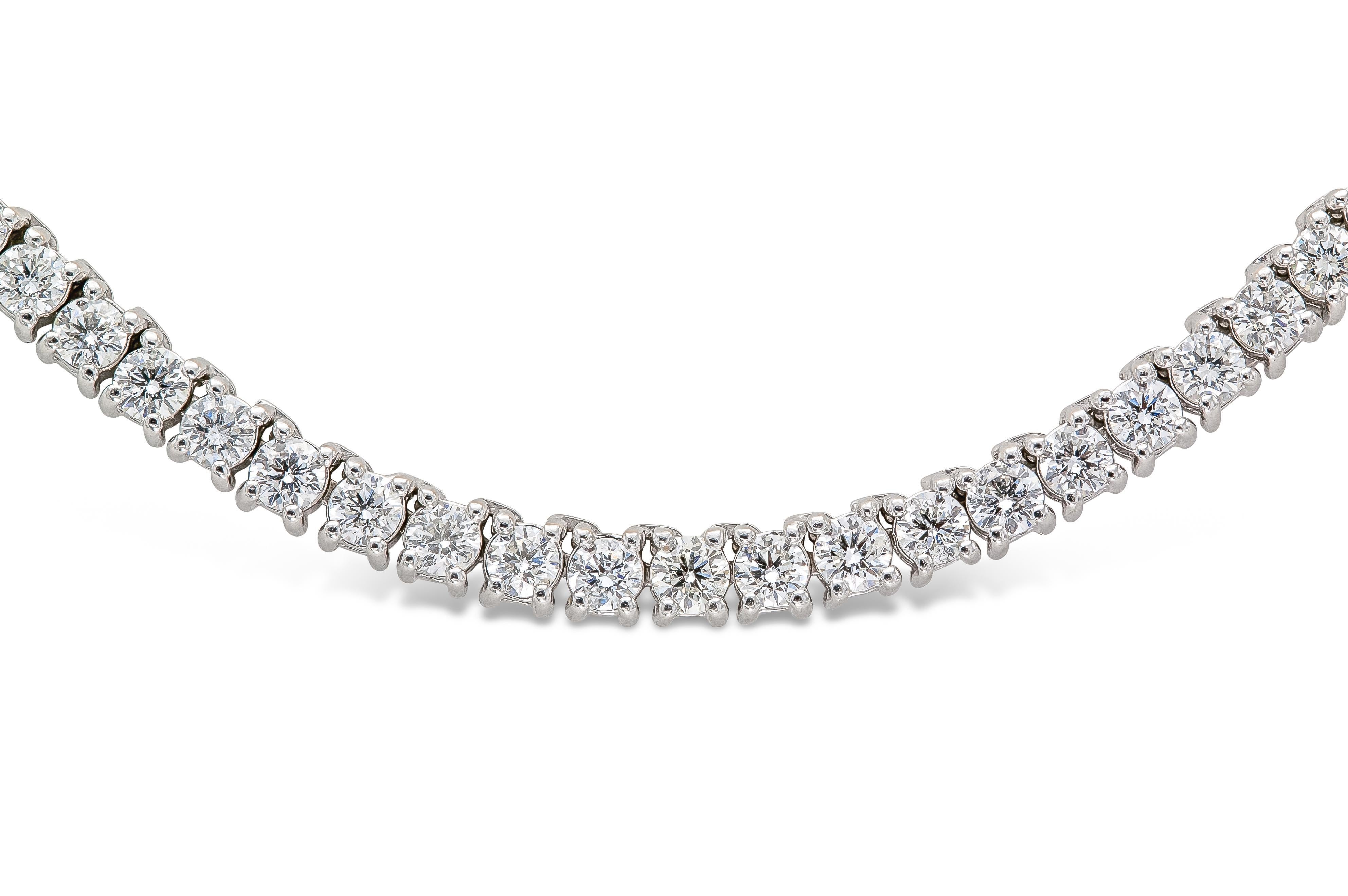 Finely crafted in 14k white gold with 197 Round Brilliant cut Diamonds weighing total of approximately 34.00 carats, G-H color, SI1-SI2 clarity.
28 1/4 inches long