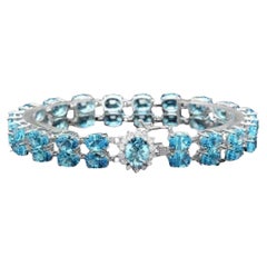 Bracelet en or blanc massif 14 carats avec topaze bleue naturelle suisse de 34,00 carats et diamants