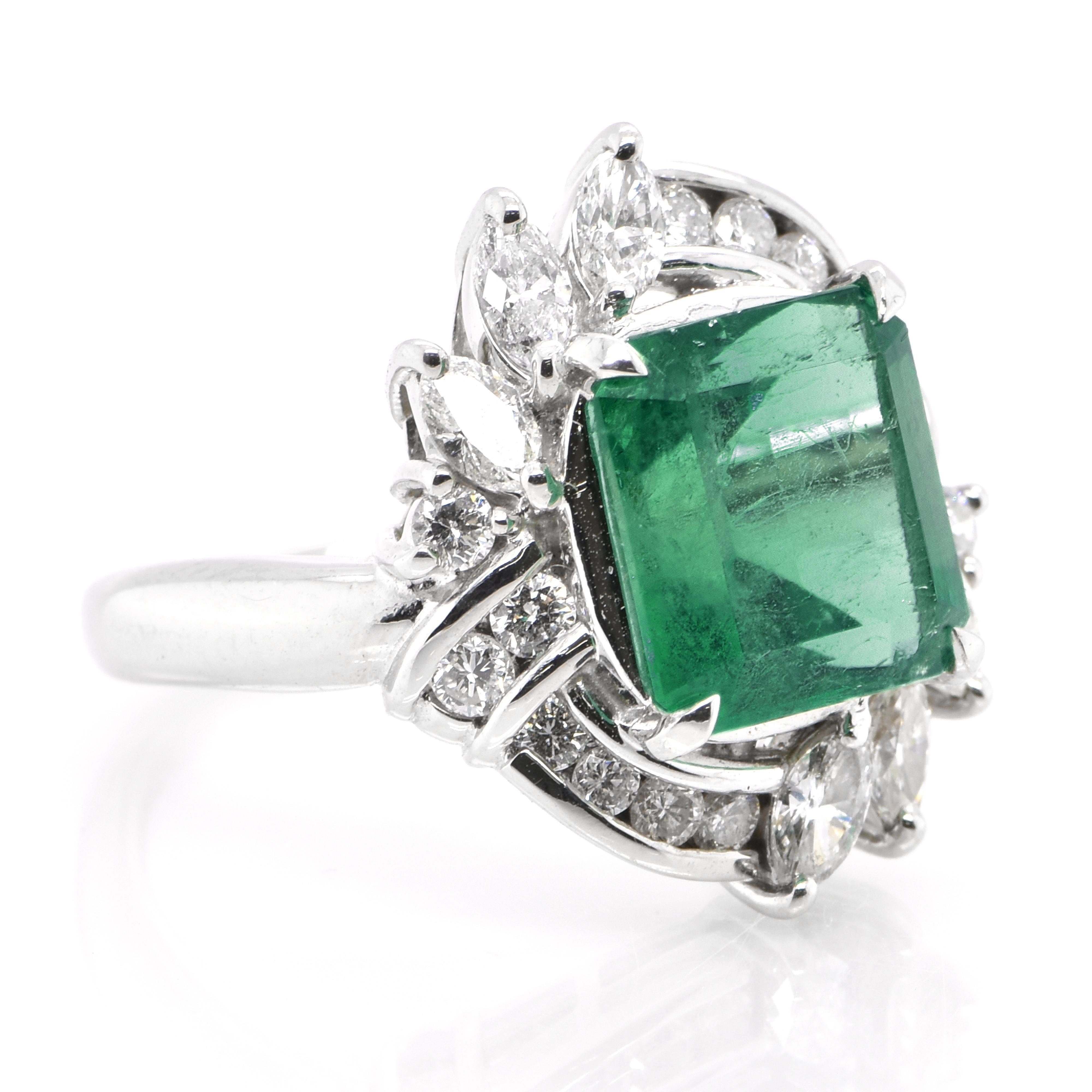 A stunning Estate ring featuring a 3.41 Carat Natural Emerald and 0.85 Carats of Diamond Accents set in Platinum. People have admired emerald’s green for thousands of years. Emeralds have always been associated with the lushest landscapes and the