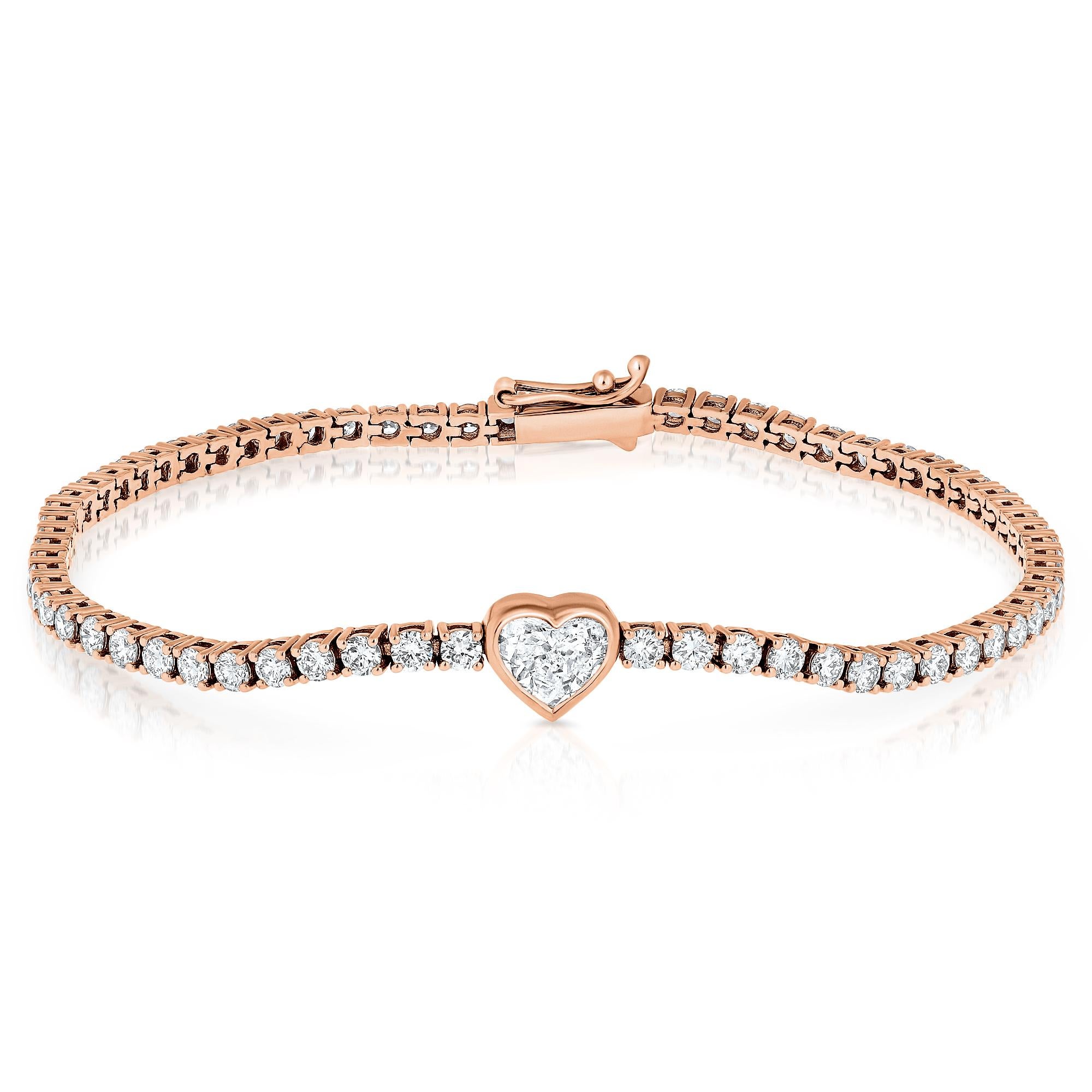 Meet our stunning White Diamond Tennis Bracelet, a total head-turner at 3.41 carats. The main attraction? A sweet 0.64-carat heart-shaped white diamond, adding just the right touch of charm. Crafted with care in 14K rose gold, it's got the perfect