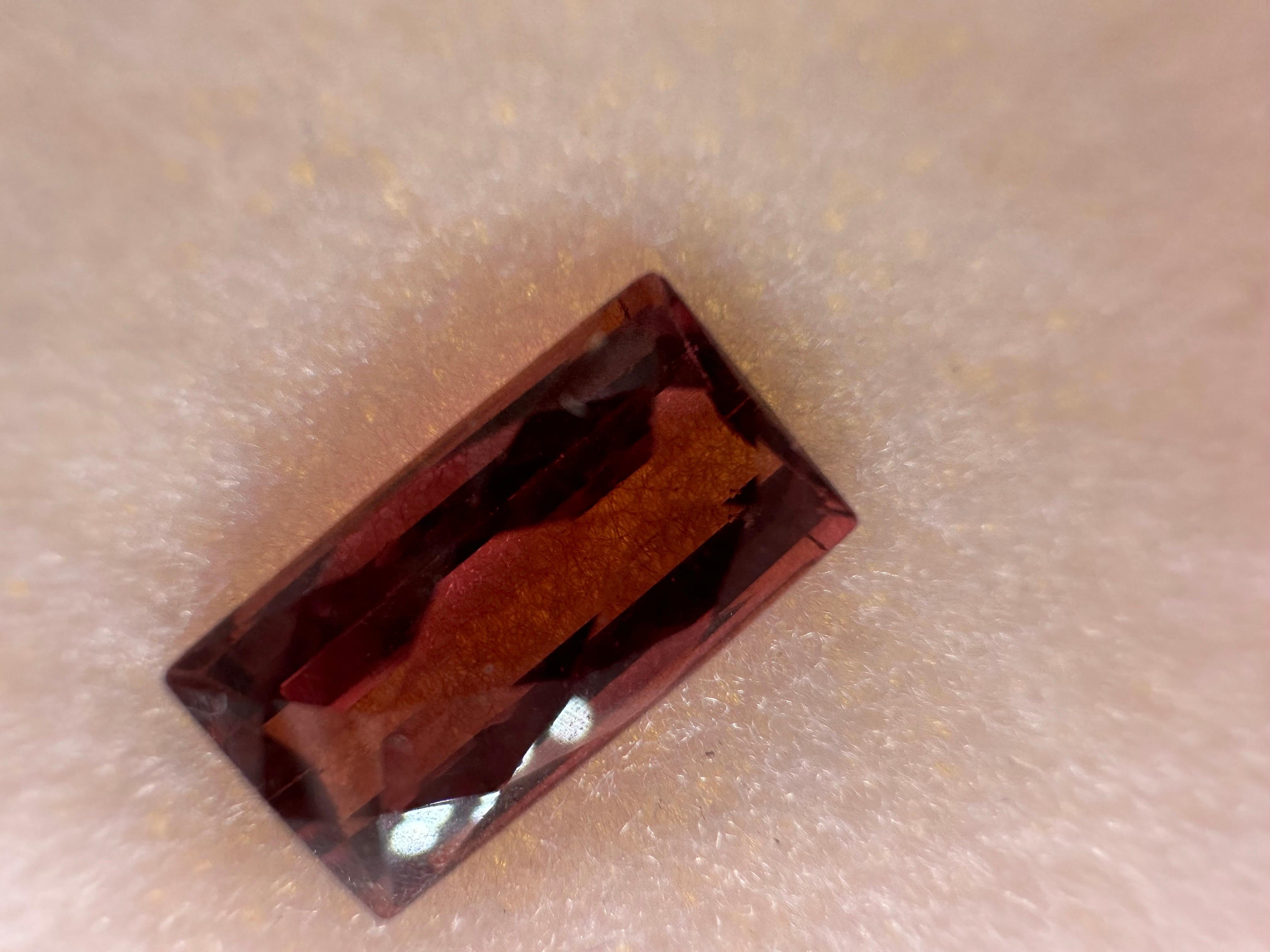 Pink tourmaline, beautiful and will come with a certificate of authenticity.

NATURAL GEMSTONE(S): Pink Tourmaline
Clarity/Color: Slightly Included/Pink
Cut: Rectangular
Treatment: none


WHAT YOU GET AT STAMPAR JEWELERS:
Stampar Jewelers, located