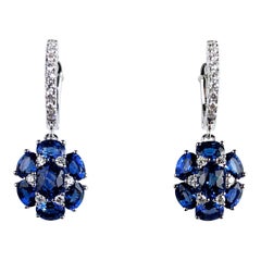 3.42 Carat Blue Sapphire Dangle Flower Earrings in 18 Karat White Gold