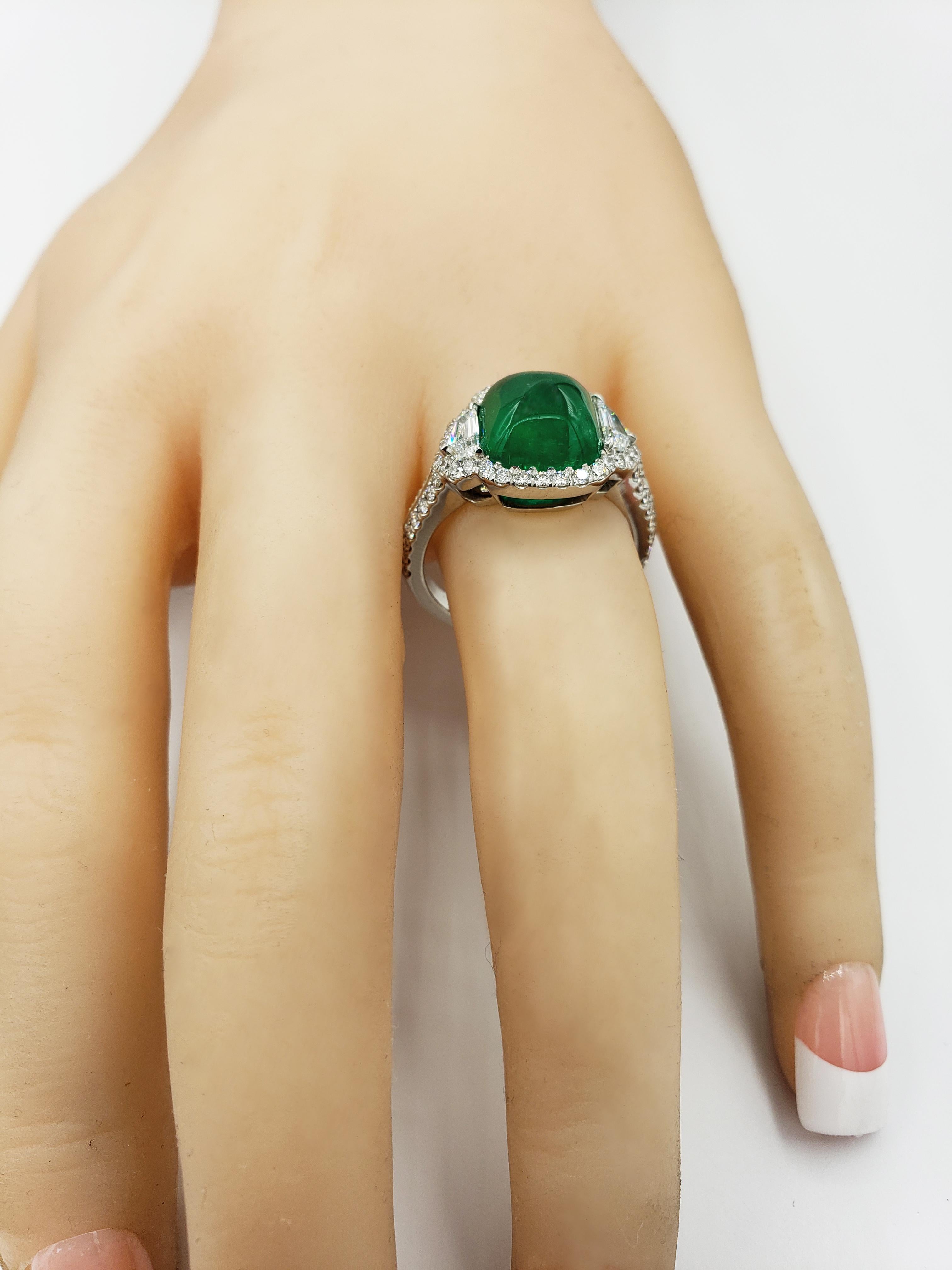 Contemporary 3.42 Carat Cabochon Emerald and Diamond Halo Three-Stone Ring