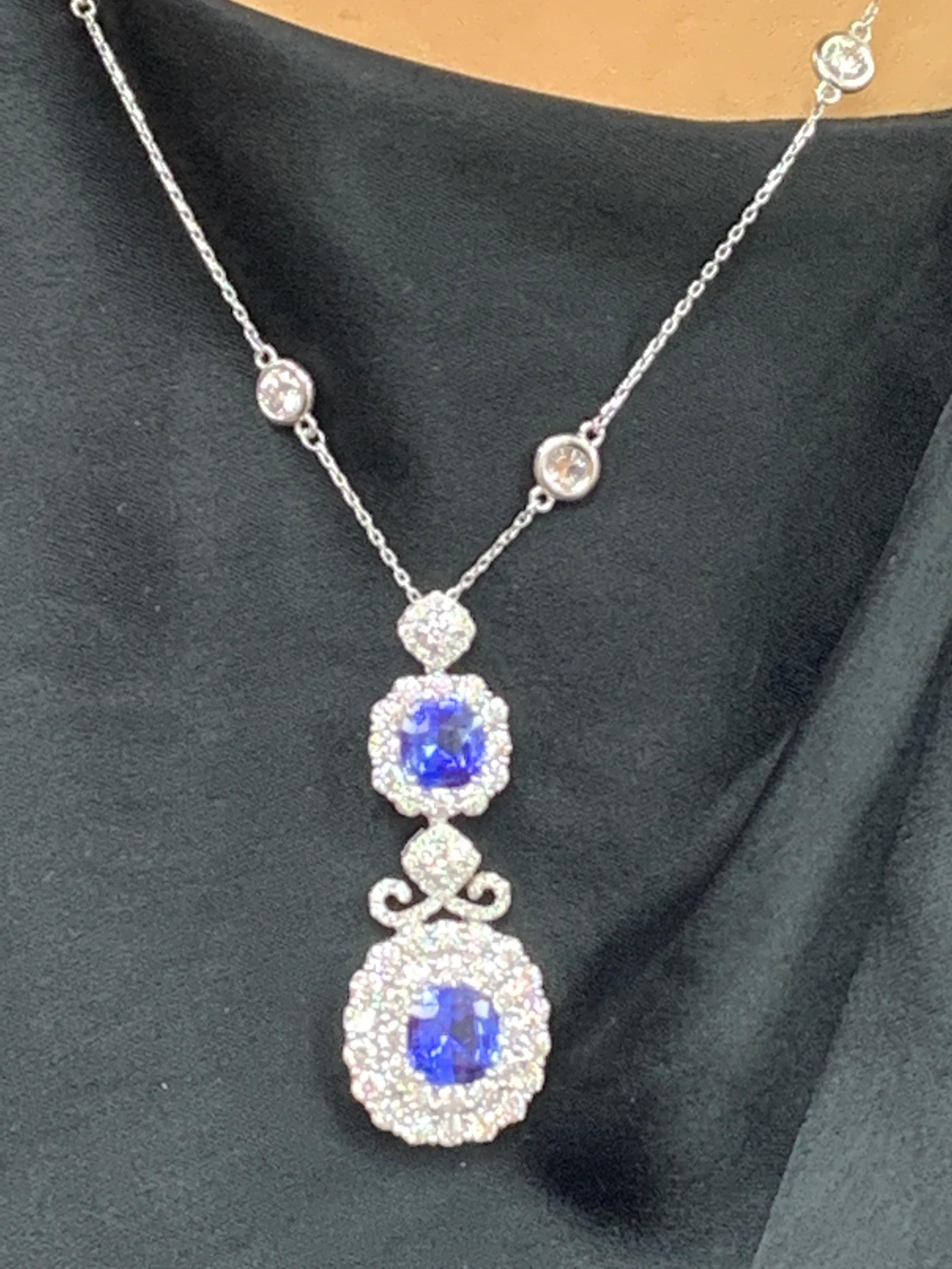 Modern 3.42 Carat Cushion Cut Blue sapphire and Diamond Halo Pendant in 18 White Gold For Sale