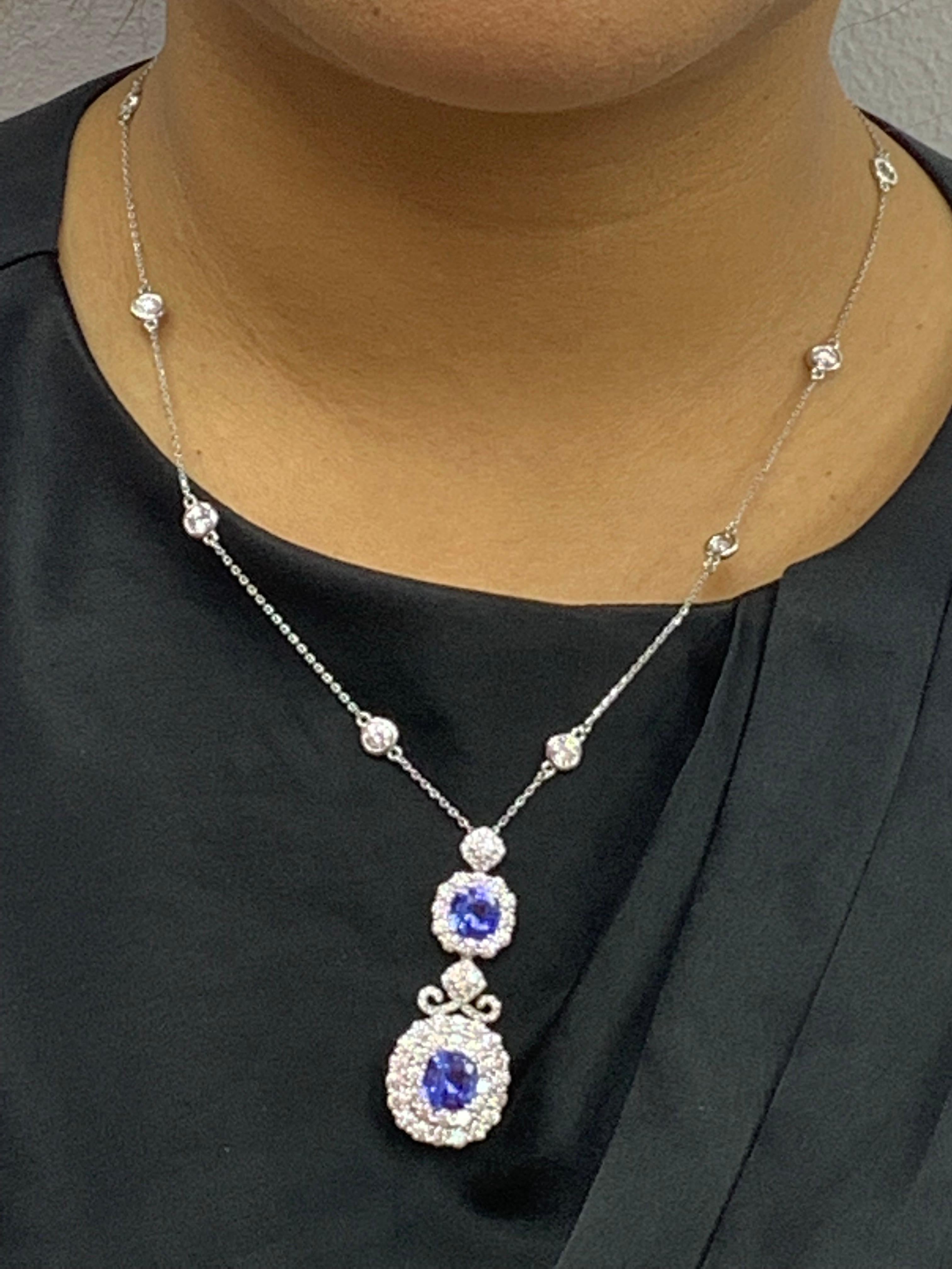 3.42 Carat Cushion Cut Blue sapphire and Diamond Halo Pendant in 18 White Gold In New Condition For Sale In NEW YORK, NY
