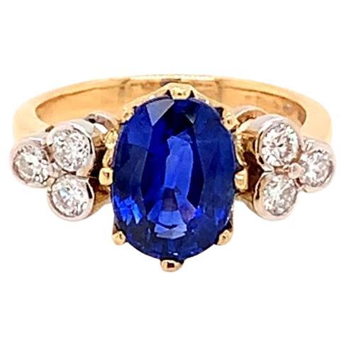 3.42 Carat Oval Blue Sapphire and Diamond Ring in 18K Yellow Gold For Sale