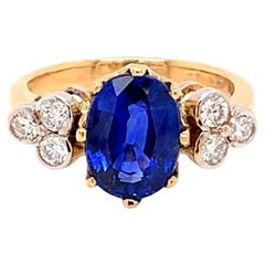 3.42 Carat Oval Blue Sapphire and Diamond Ring in 18K Yellow Gold
