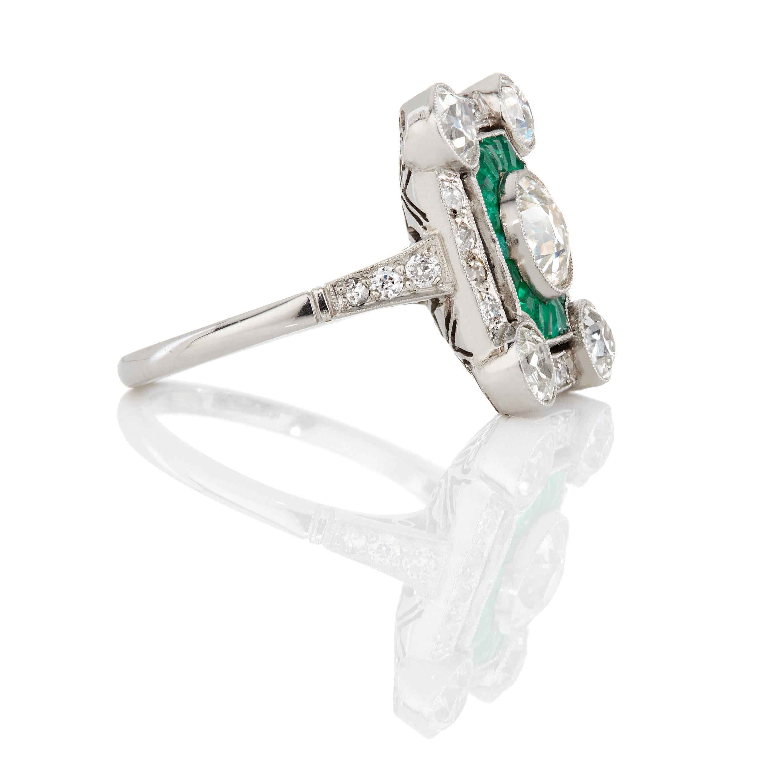 Overall Description:

Center Diamond: 
     •6.5 x 6.5 x 4.35 mm
     •1.18 Carats

Natural Emerald Baguetts
     •0.32 Carats 
     
Ring Size: 6.5

Top Measure: 17.16 mm

Weight: 7.4 grams

Length: 24.96 mm 