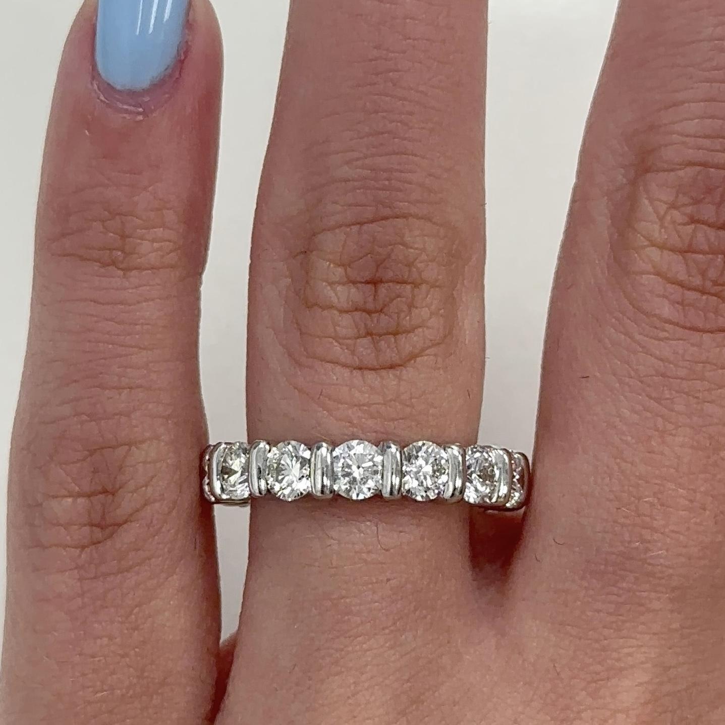 Timeless diamond eternity band, channel set.
15 round brilliant diamonds, 3.42 carats. Approximately G/H color and VS clarity. Set in 18k white gold, 5.12 grams, size 6.5.
Accommodated with an up-to-date appraisal by a GIA G.G. once purchased, upon